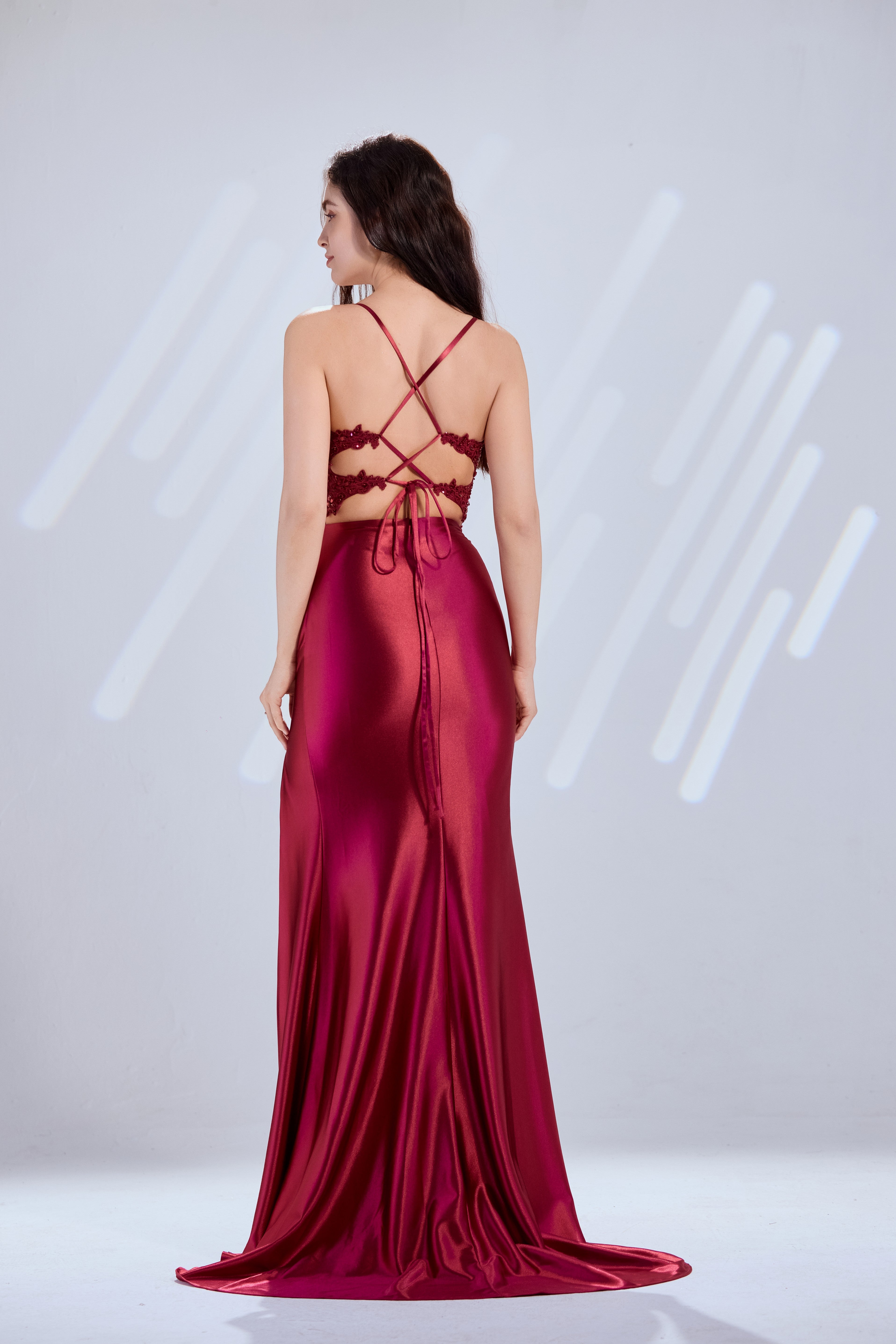 Burgundy satin mermaid prom dress with sheer lace back and lace corset straps