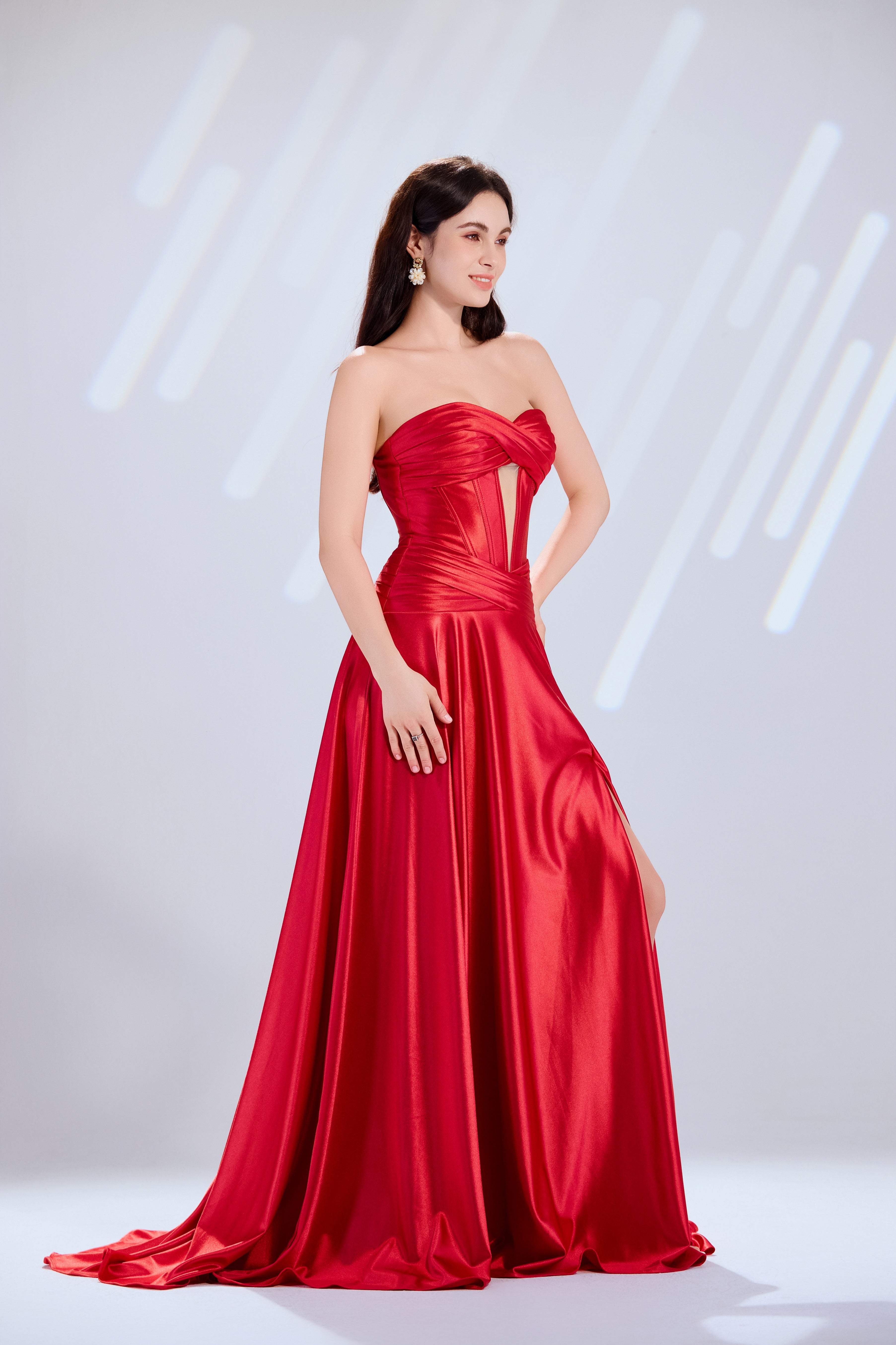 Satin strapless corset gown with crisscross bodice, red tone, sweetheart neckline, flowing skirt