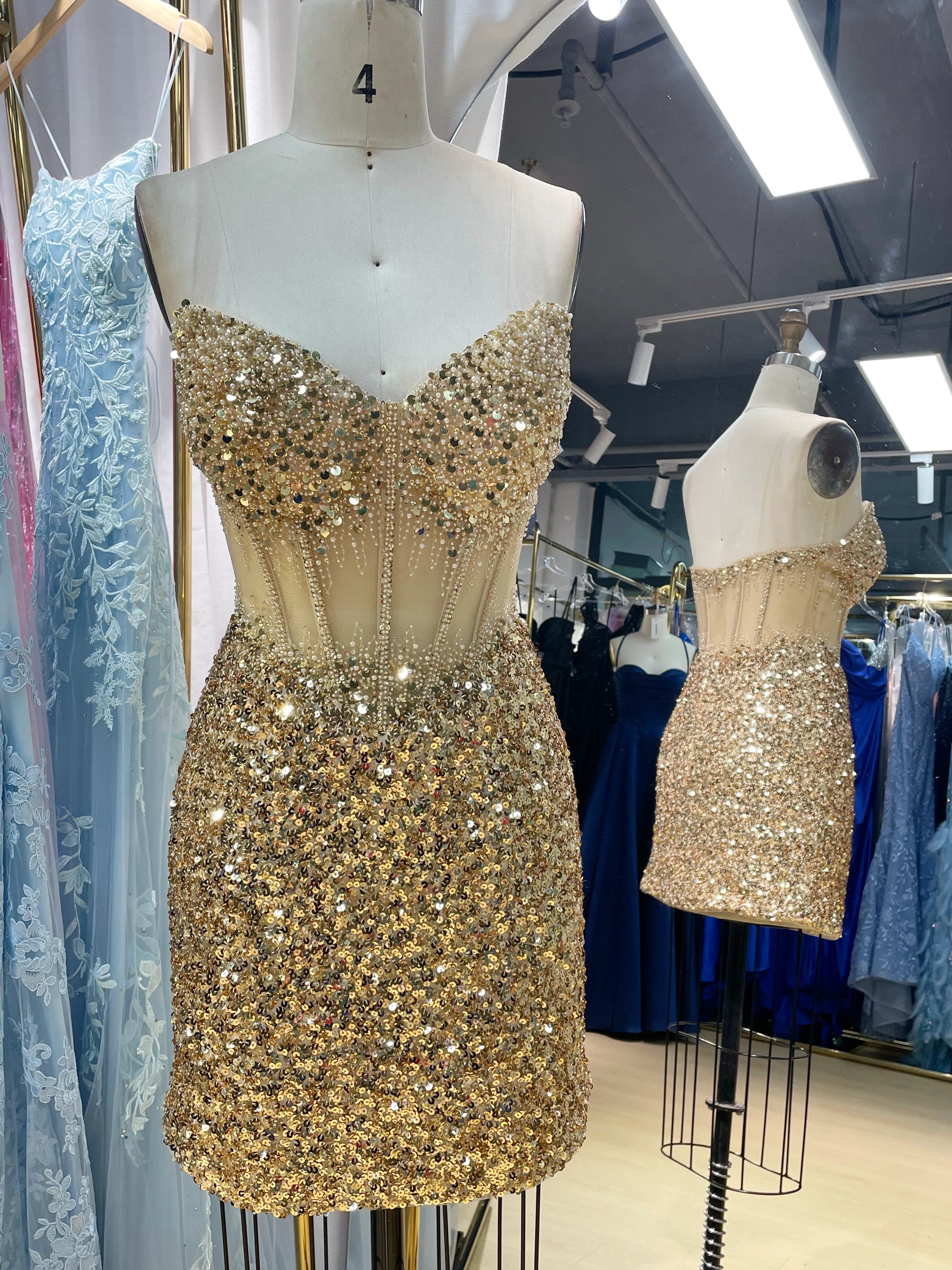 Gold sequined strapless corset mini dress with beaded bust detail