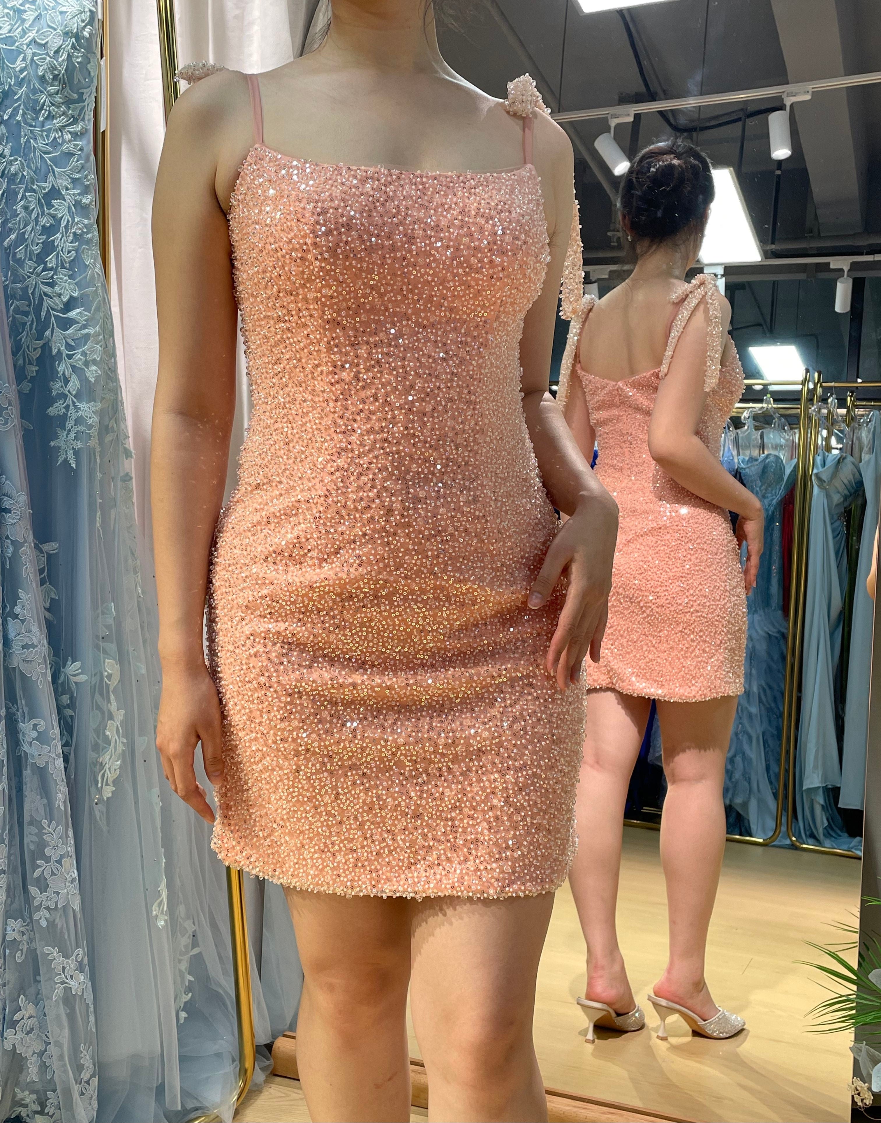 Pink fully beaded mini dress with spaghetti straps and straight neckline