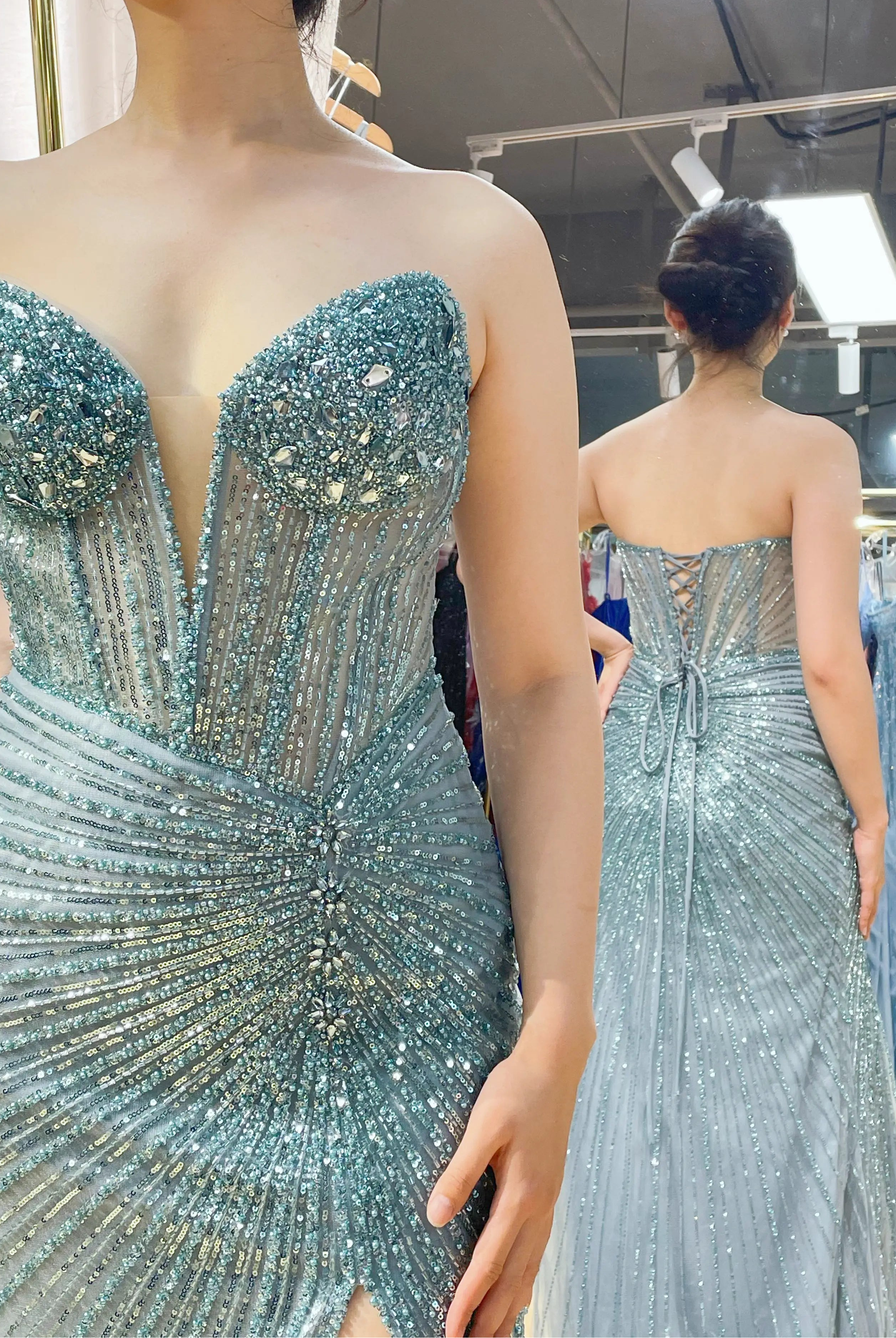 Sequin beaded corset mermaid prom dress in teal-blue with sweetheart bodice and long fitted skirt