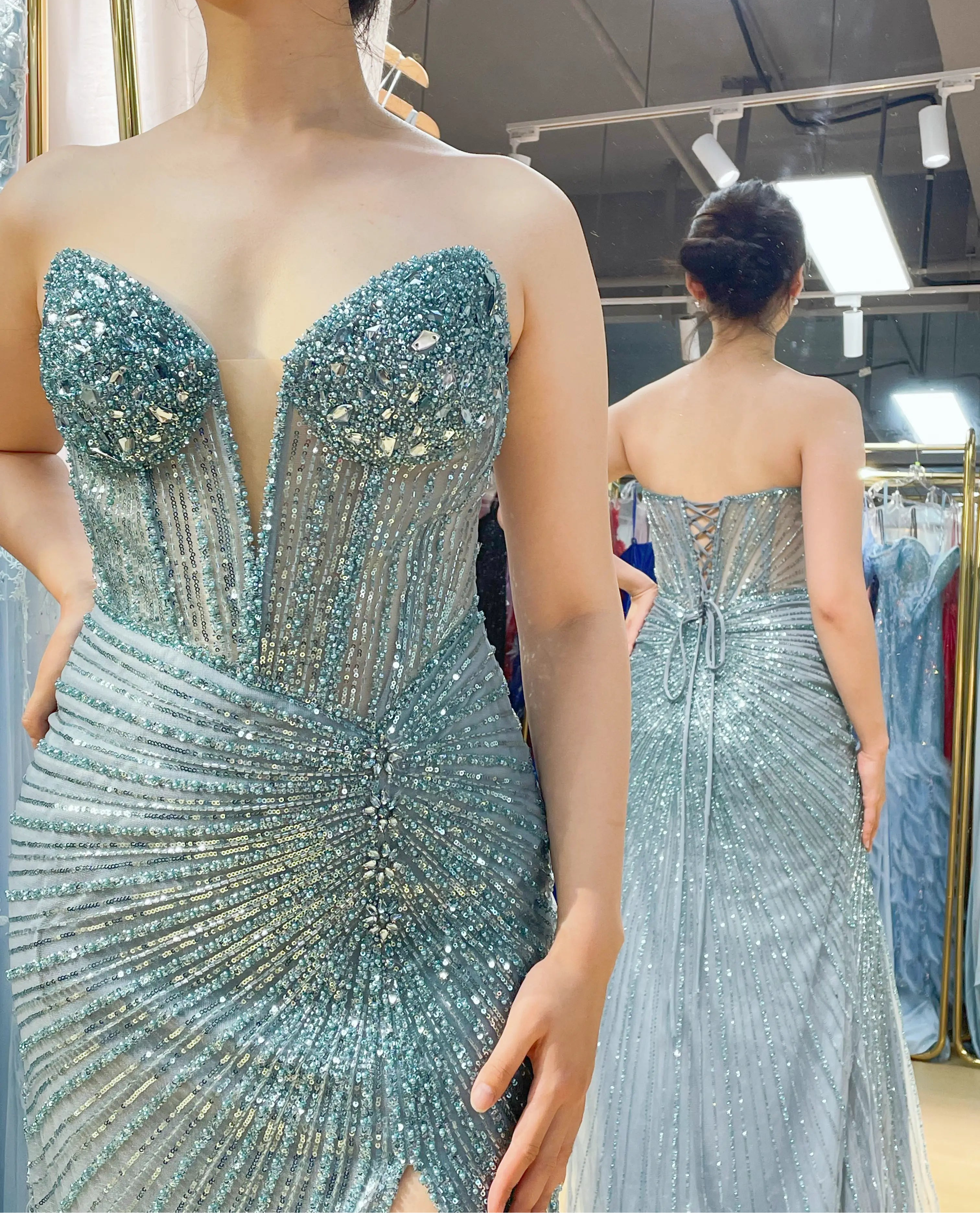 Sequin beaded corset mermaid prom dress in teal-blue with sweetheart bodice and long fitted skirt