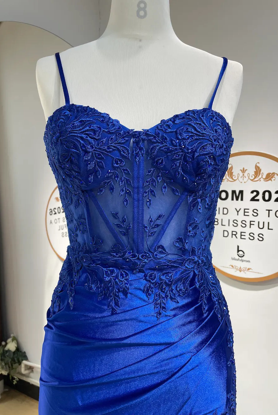 Royal blue lace corset-style evening dress with spaghetti straps and ruched skirt