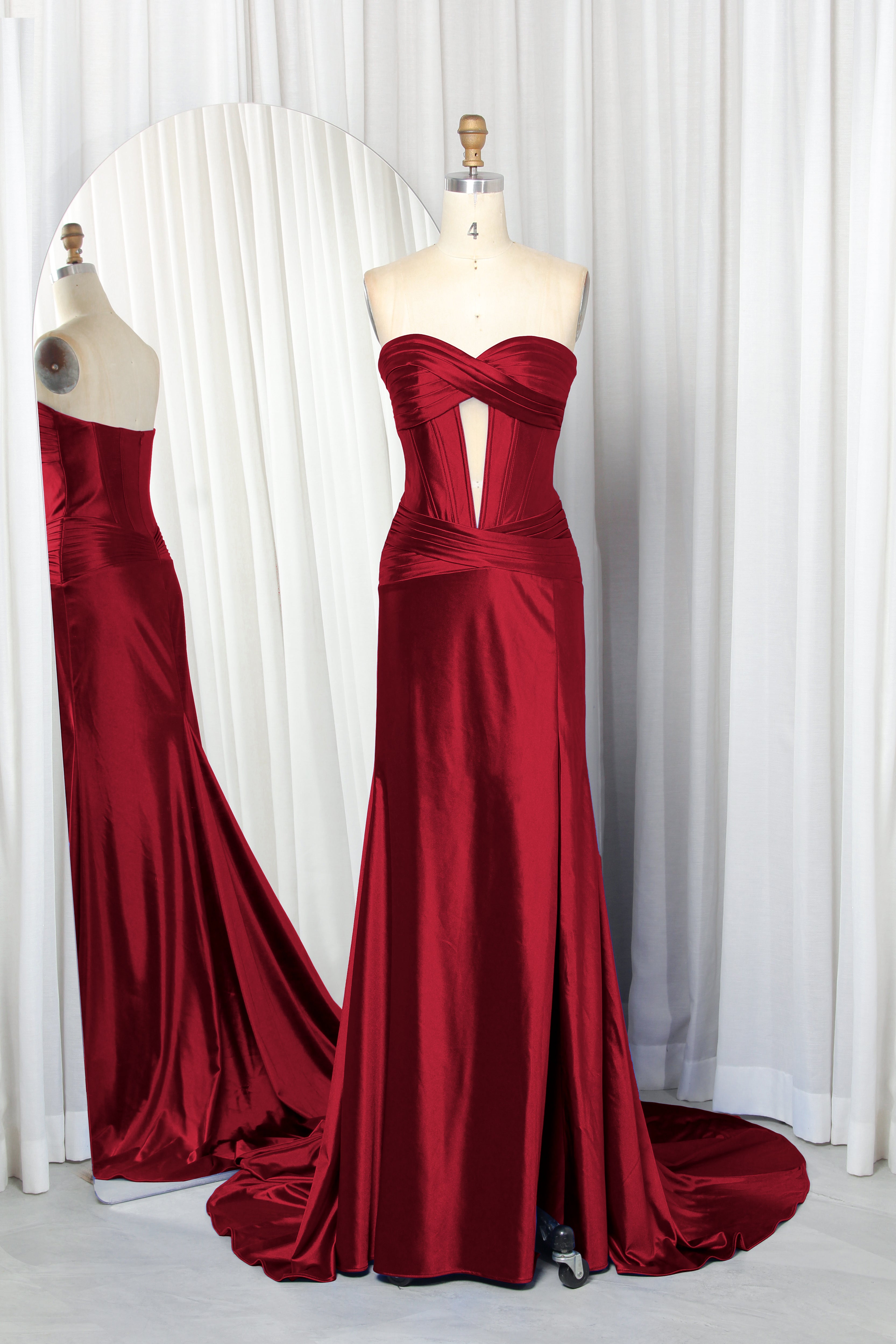 strapless satin prom dress with a front cutout