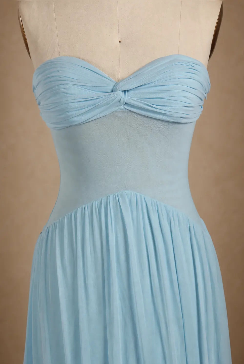 Sky blue strapless sweetheart dress with bow detail, ruched bodice, pleated skirt