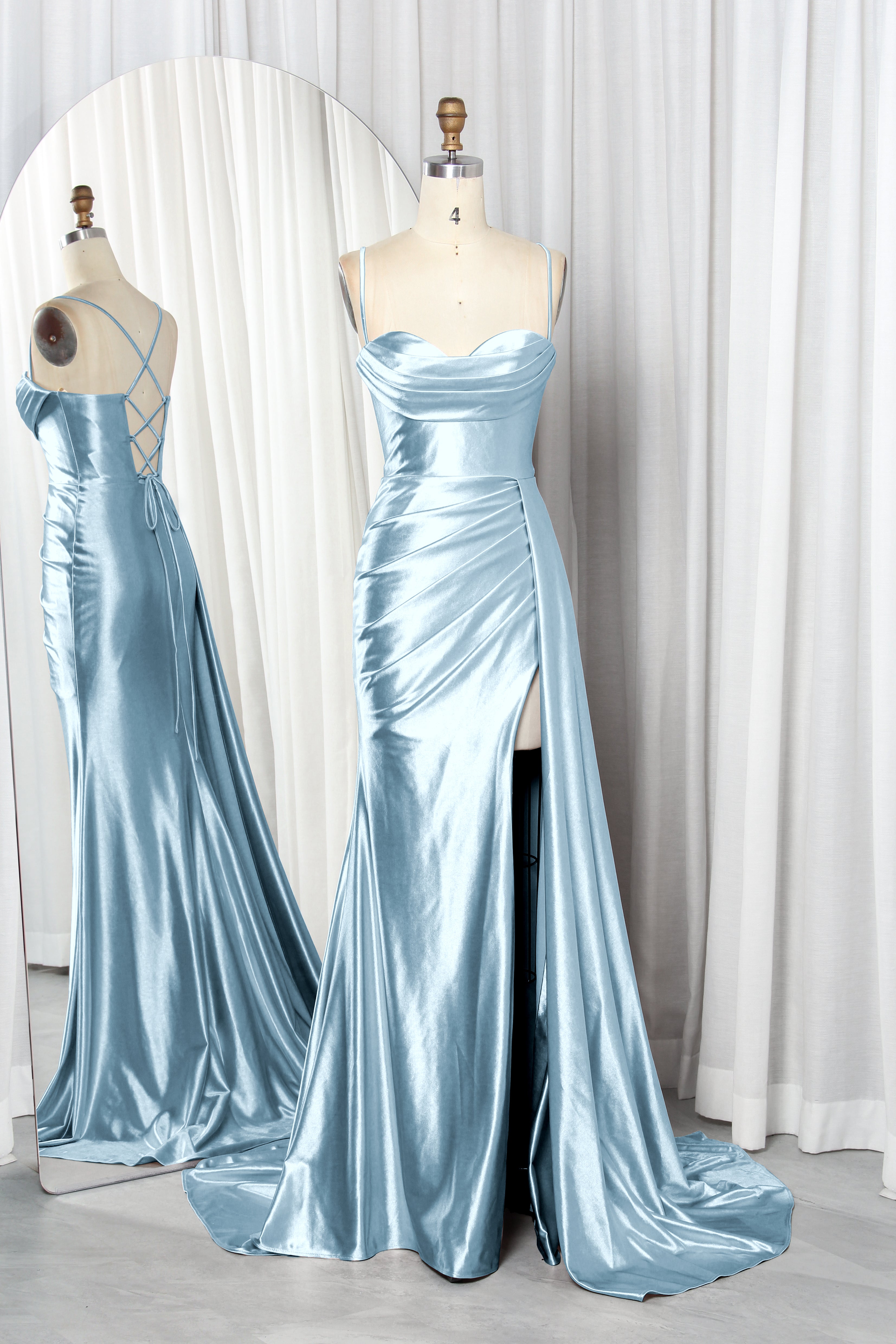 satin prom dress with spaghetti straps, a draped bodice, and a high slit.