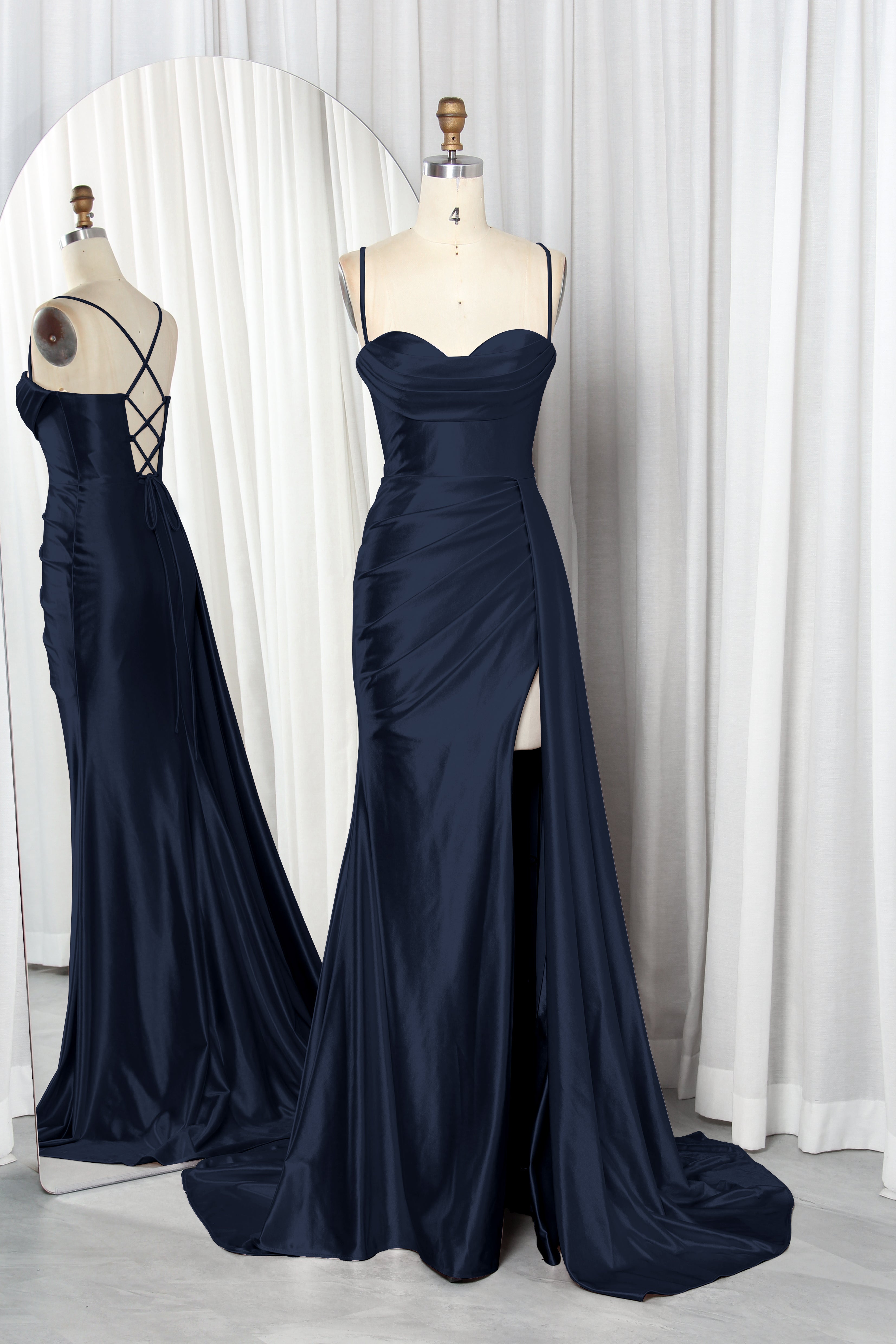 satin prom dress with spaghetti straps, a draped bodice, and a high slit.