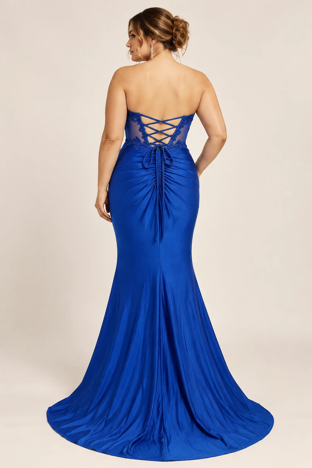 Royal blue plus-size gown, crisscross back straps, ruched waist, flowing mermaid skirt
