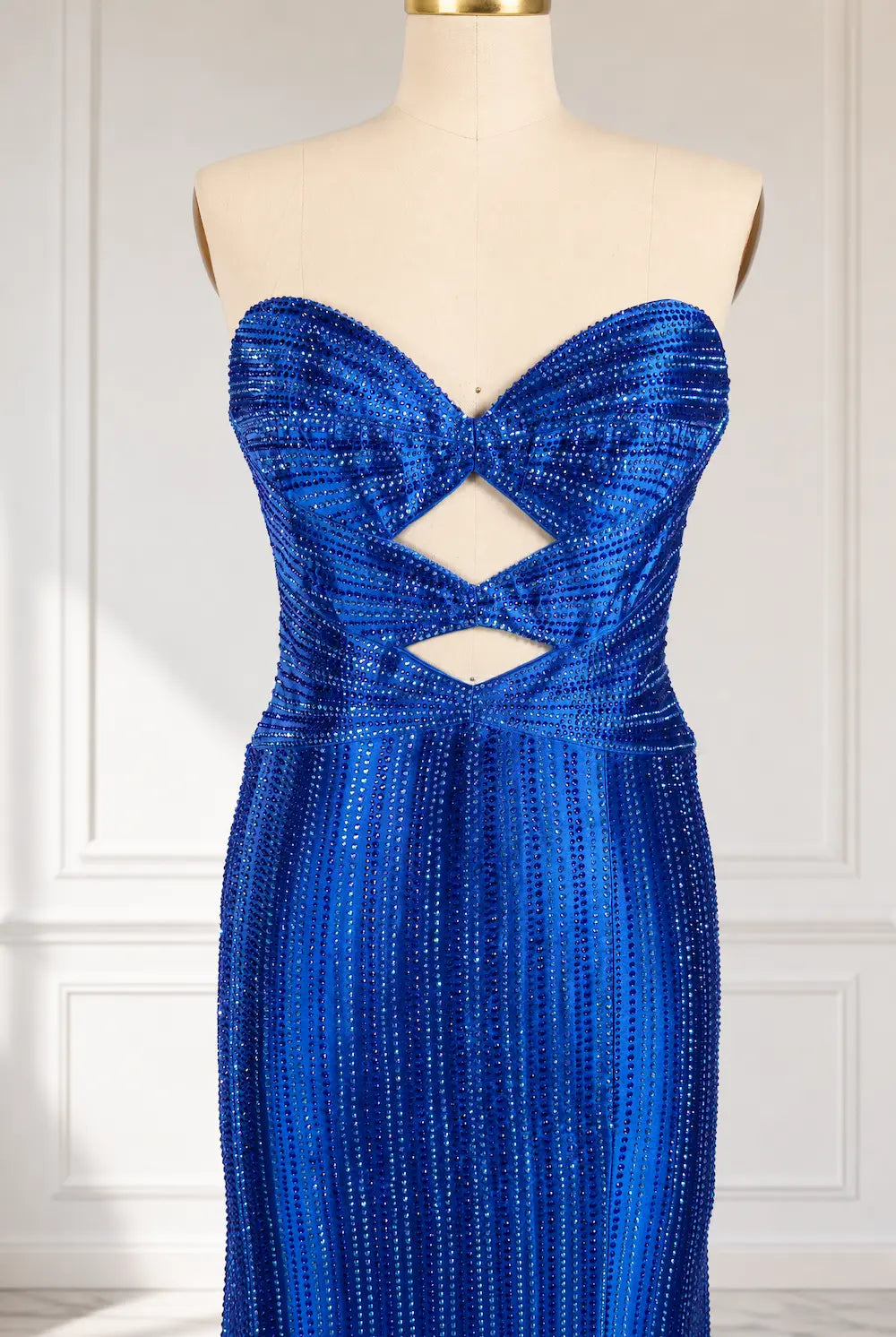 Royal blue sequin strapless gown with crisscross cutout bodice