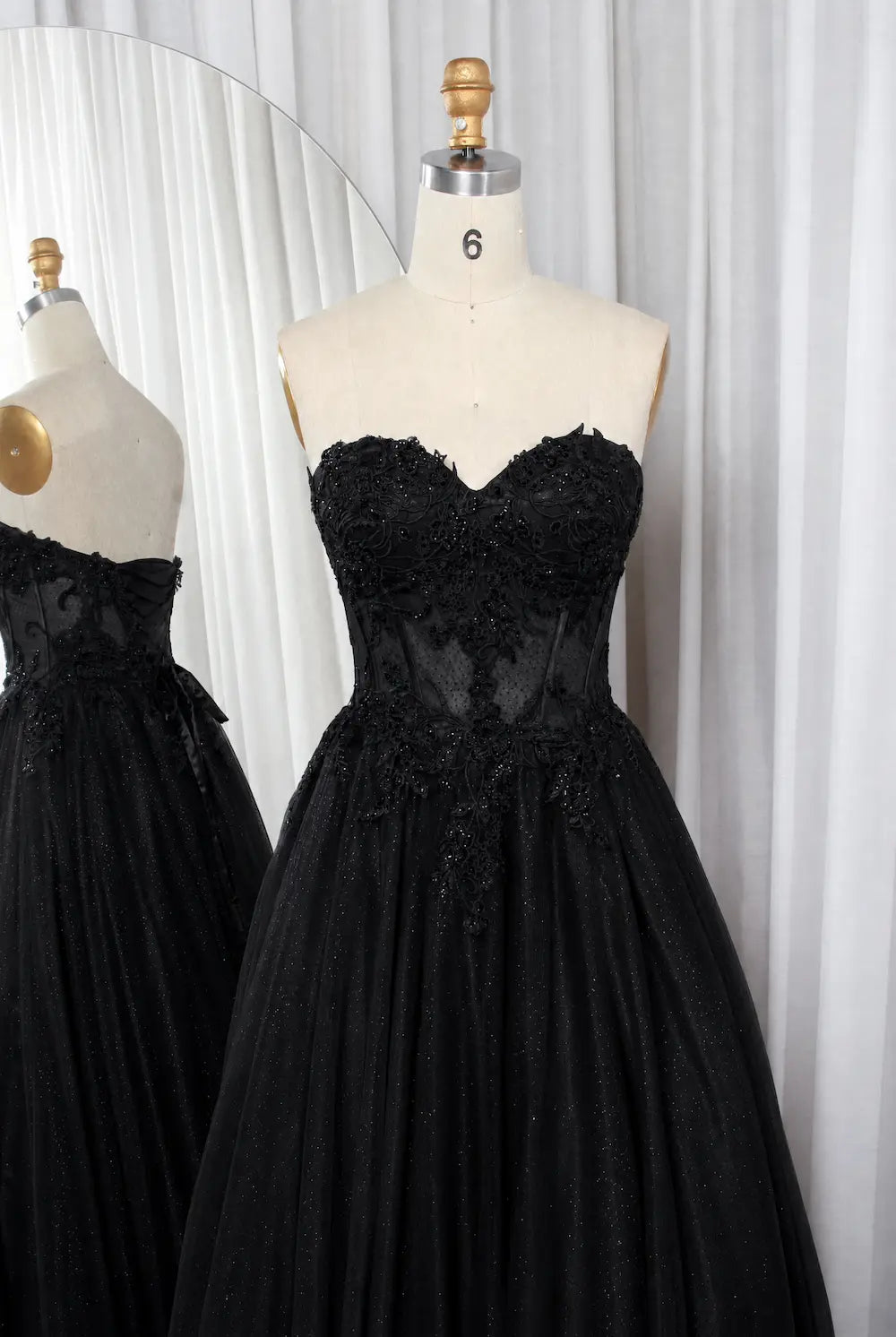 Black strapless lace ball gown with sweetheart neckline and glitter tulle skirt