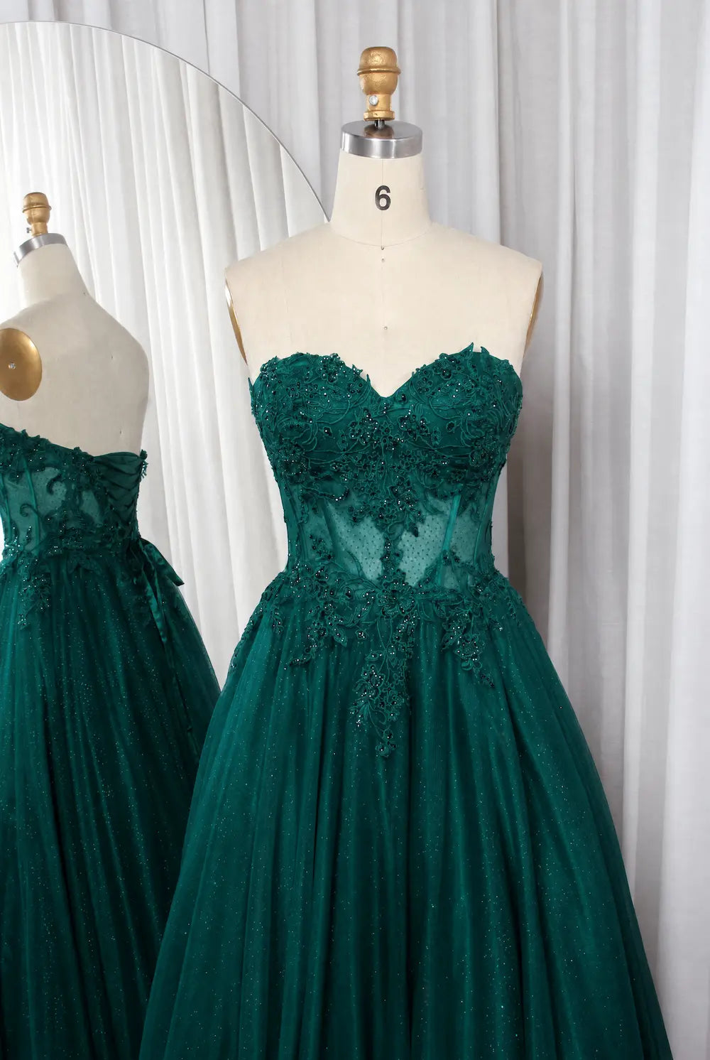 Emerald strapless lace ball gown with sweetheart neckline and tulle skirt
