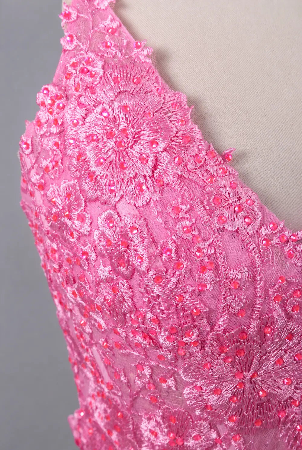 Pink rhinestone lace mermaid prom dress bodice with floral embellishment detail