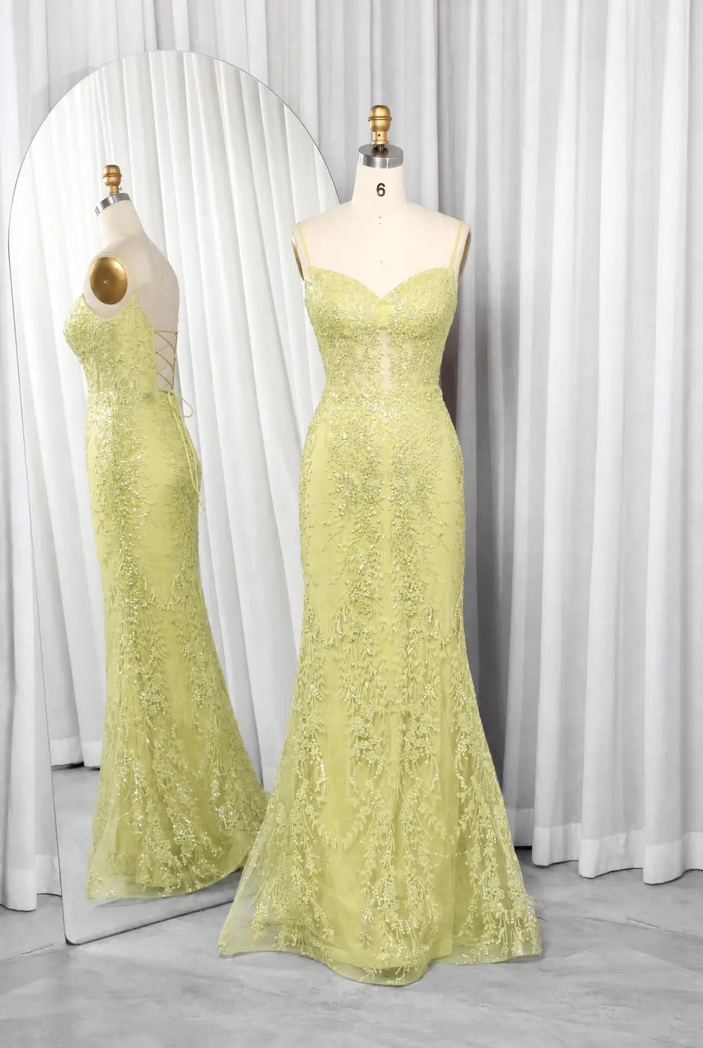 Light yellow mermaid corset prom dress with lace texture and thin straps