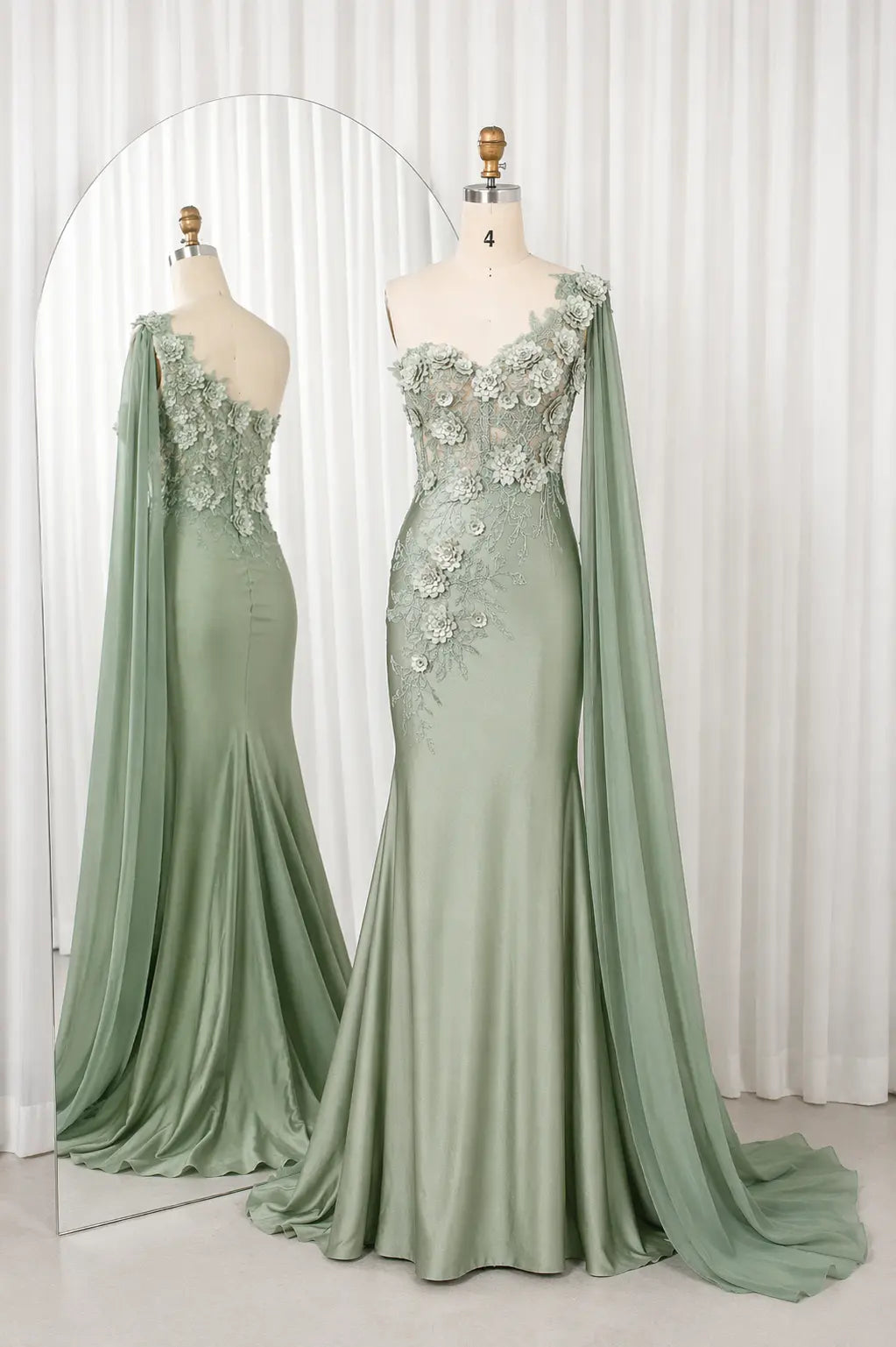 Sage one-shoulder satin gown with 3D floral appliqués and flowing sleeves
