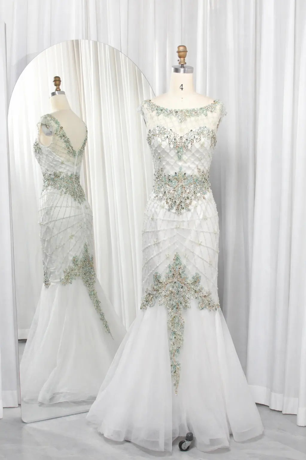 Sage mermaid mother-of-the-bride dress with illusion neckline and silver beaded details