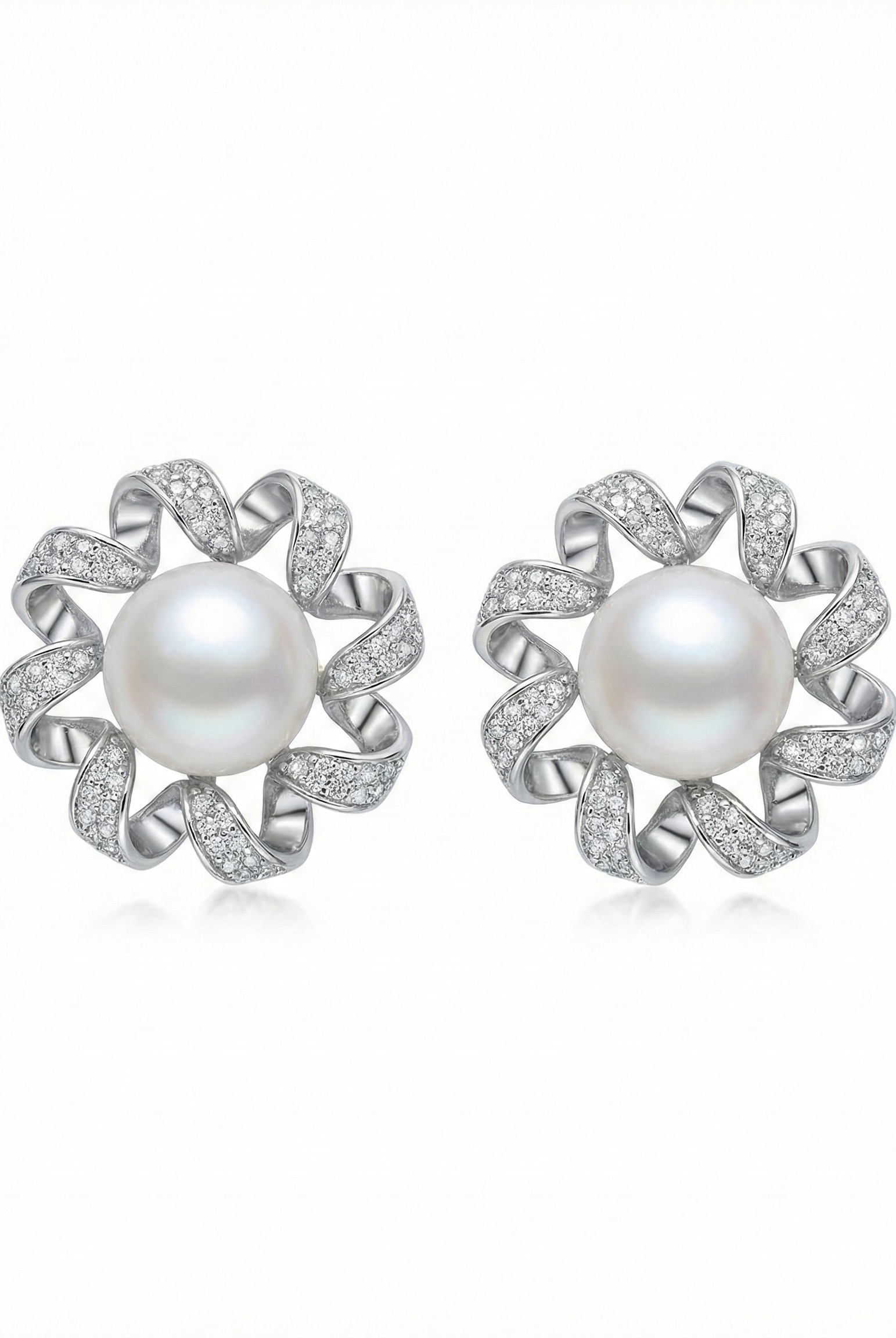 Silver-tone spiral flower pearl stud earrings with white pearl center and petal metalwork