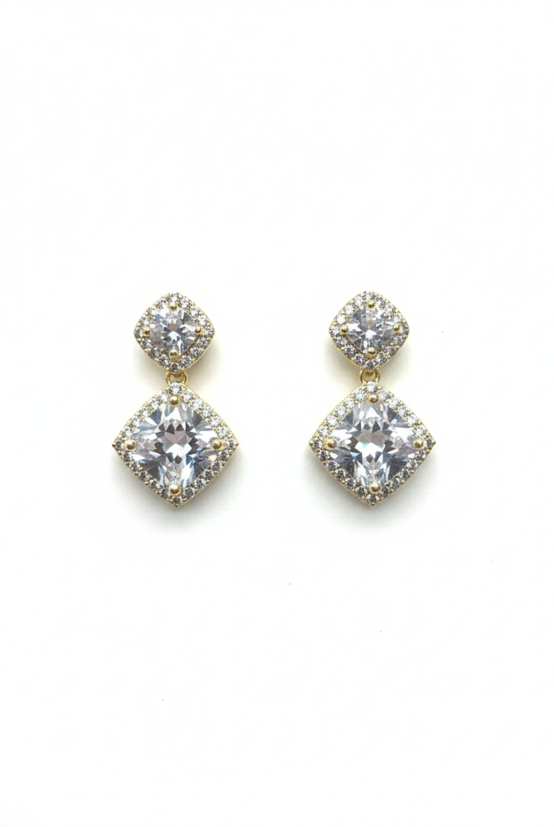 Gold-tone double drop earrings with square crystals, round center, and larger square drop