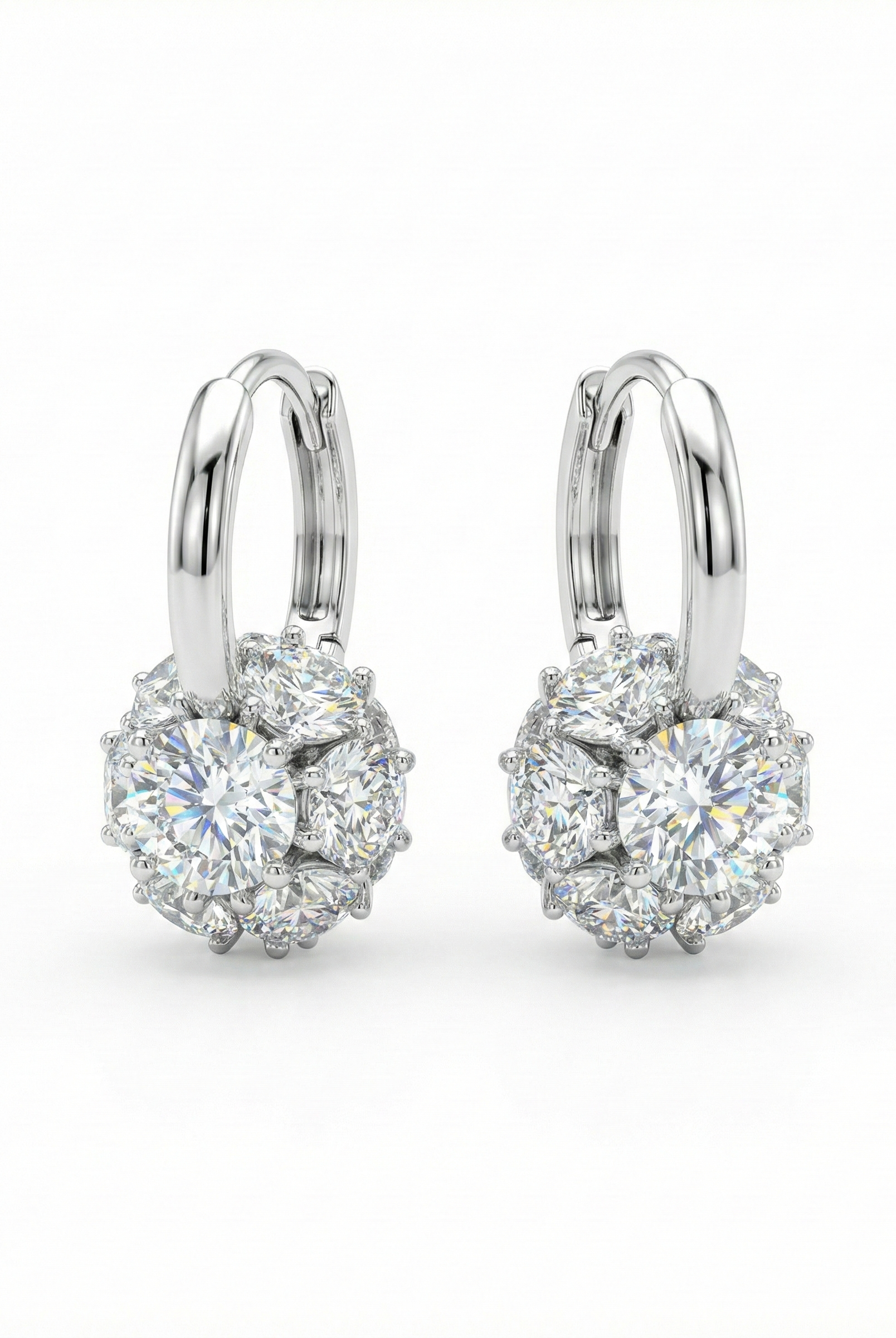 Silver-tone huggie hoop earrings with crystal flower cluster and ball drop