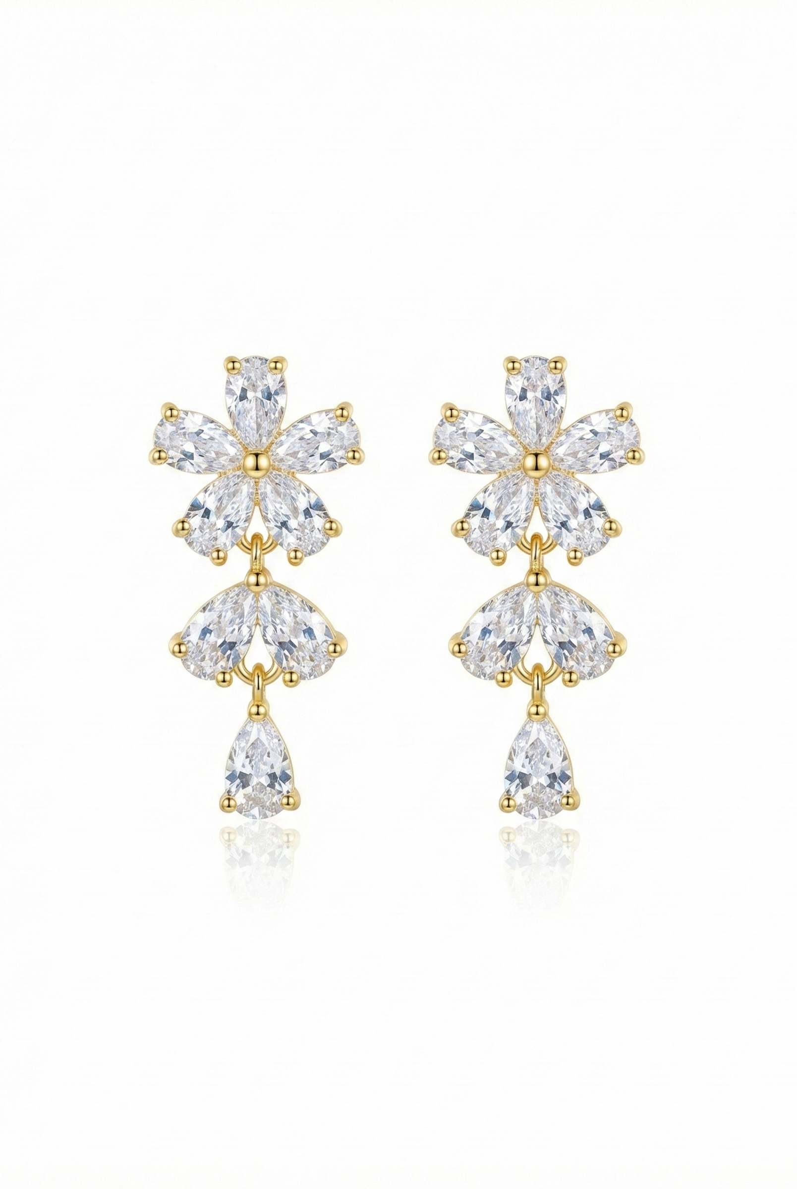 Gold-tone floral crystal drop earrings with marquise and teardrop stones, gold hooks