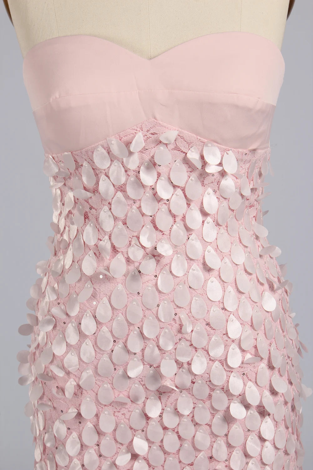 Pink sequin overlay bodice and skirt with leaf-shaped sequins