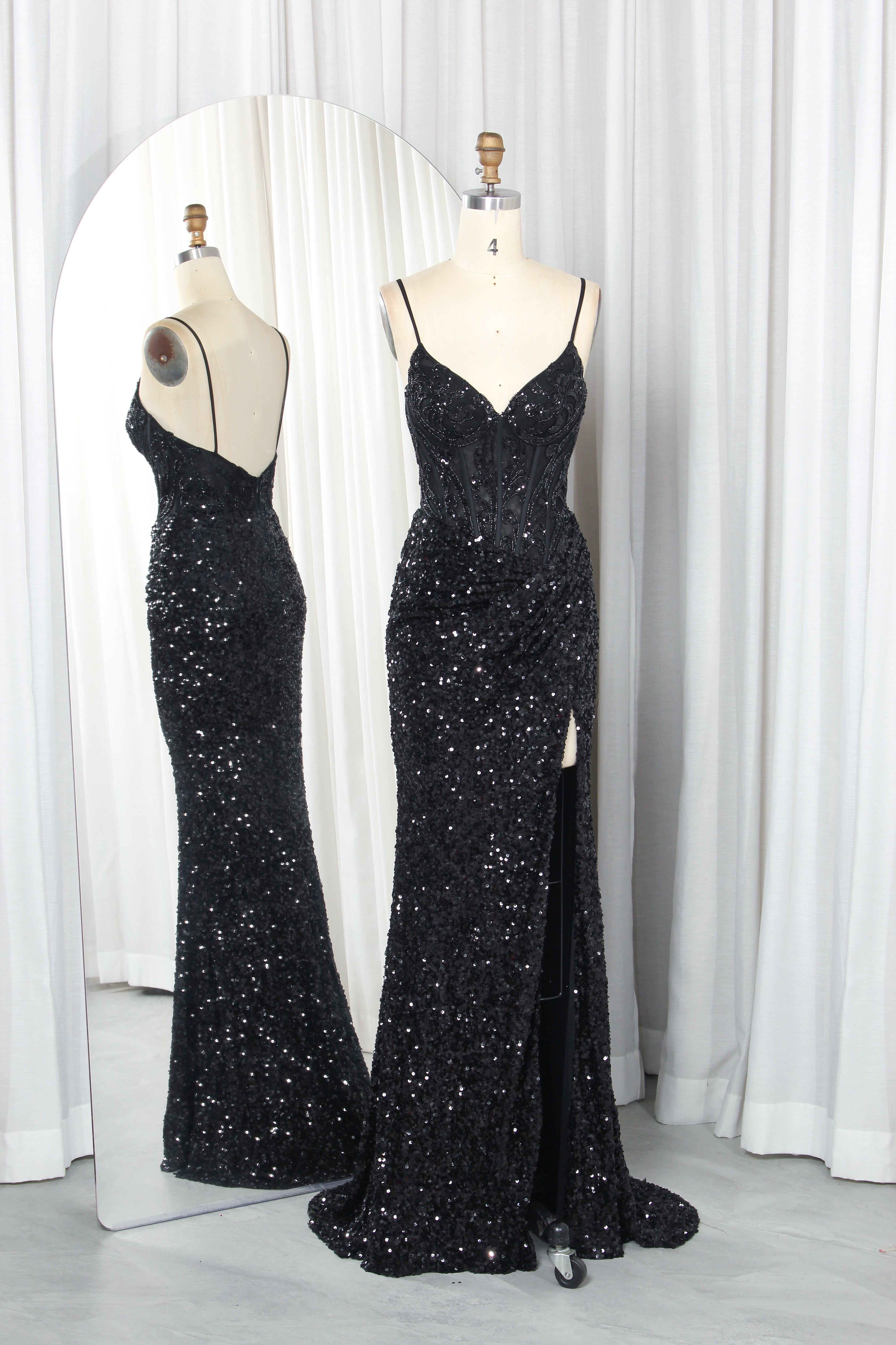 sequin gown with a sheer corset bodice and high slit.