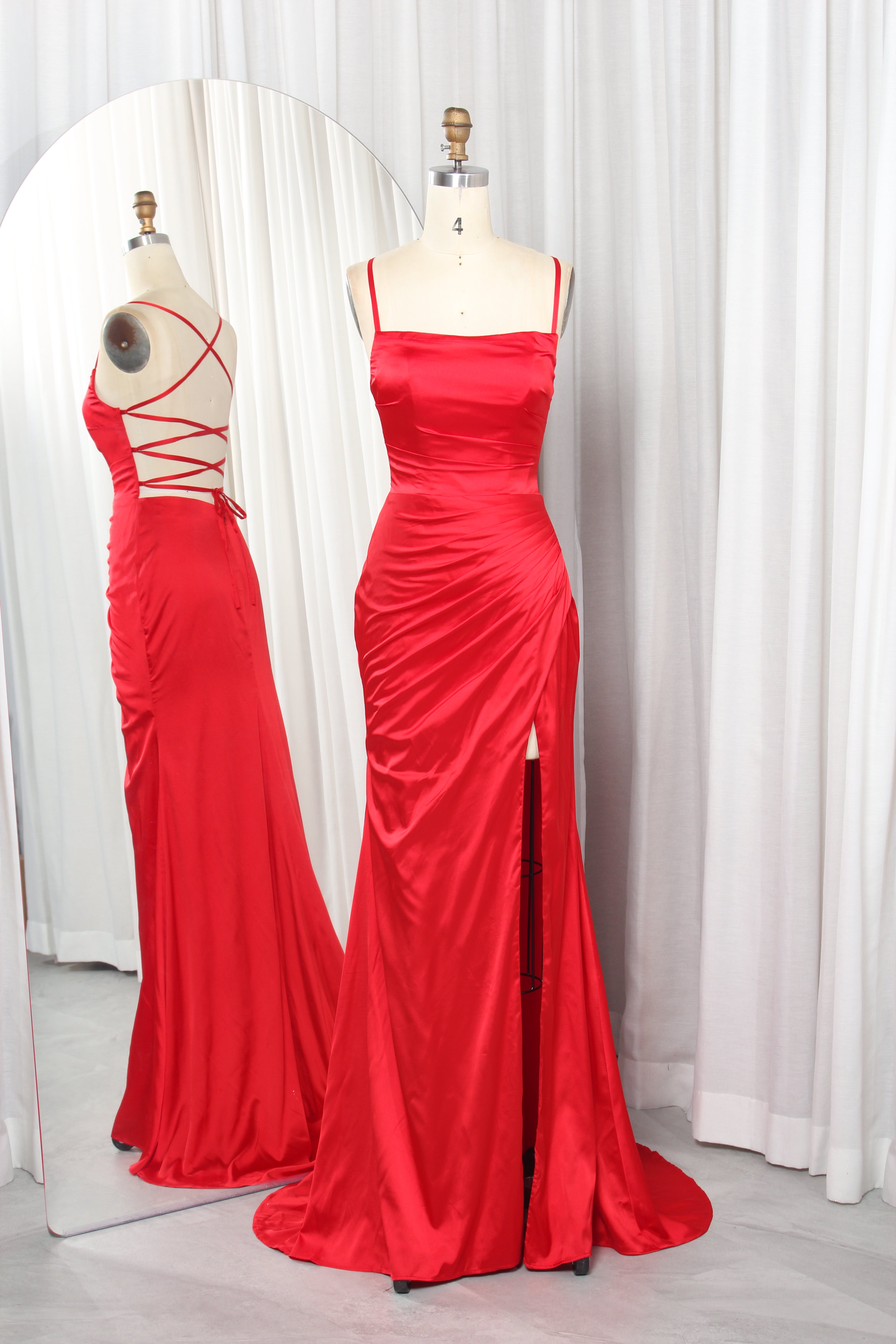 Red satin prom gown with criss-cross lace-up back and front slit skirt