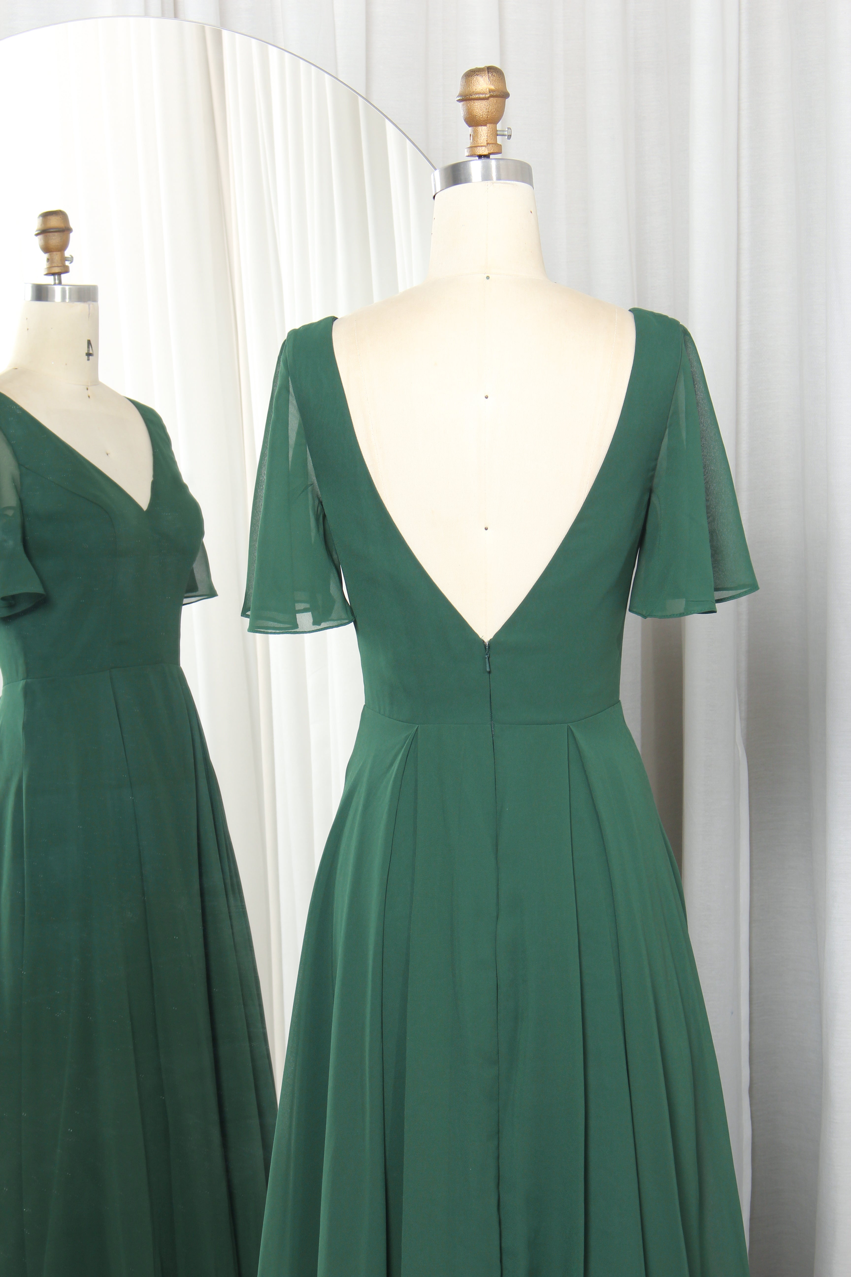 V-neck chiffon dress with flutter sleeves and a V-back.