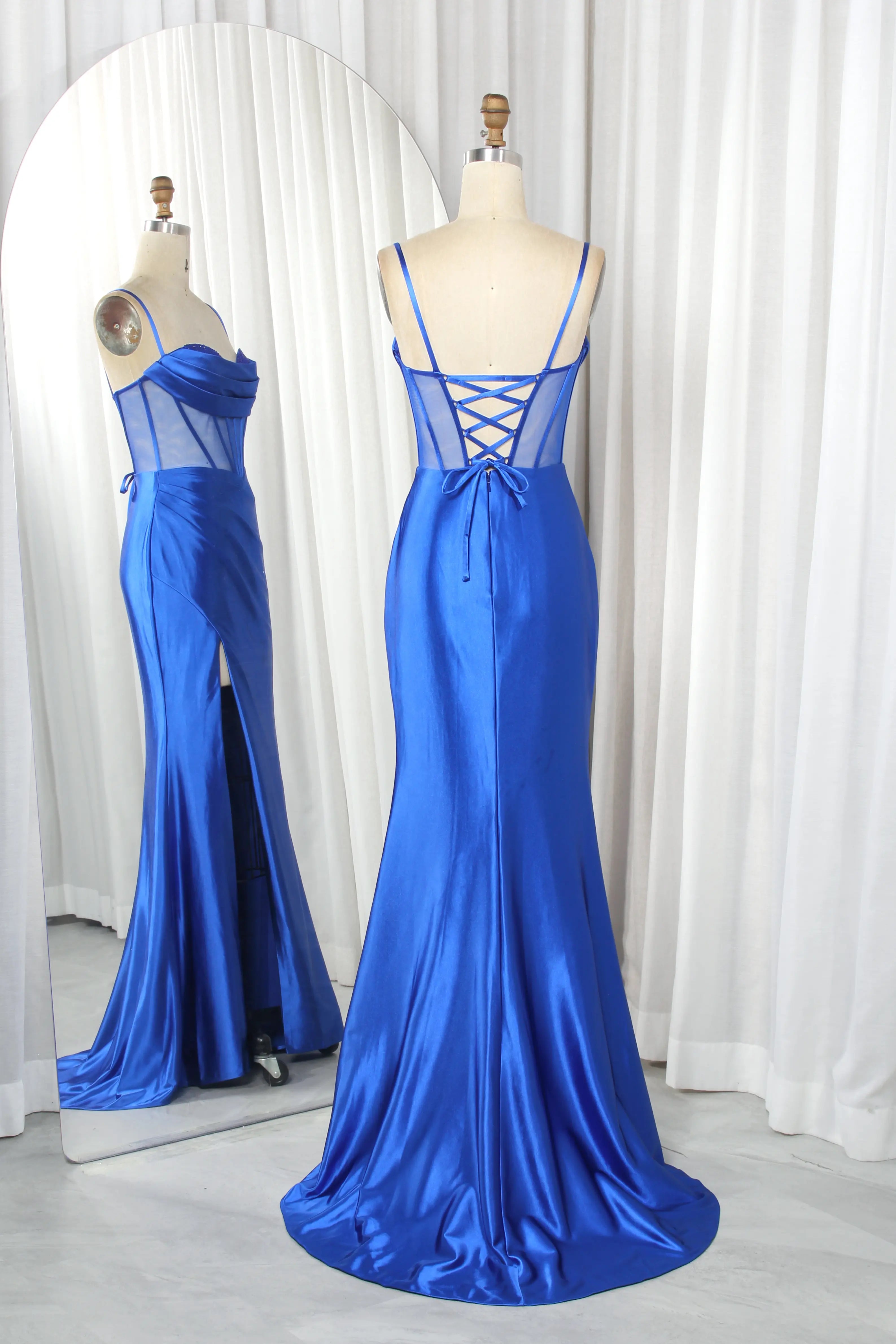 Royal blue satin mermaid prom dress with sheer mesh panel and crisscross lace back