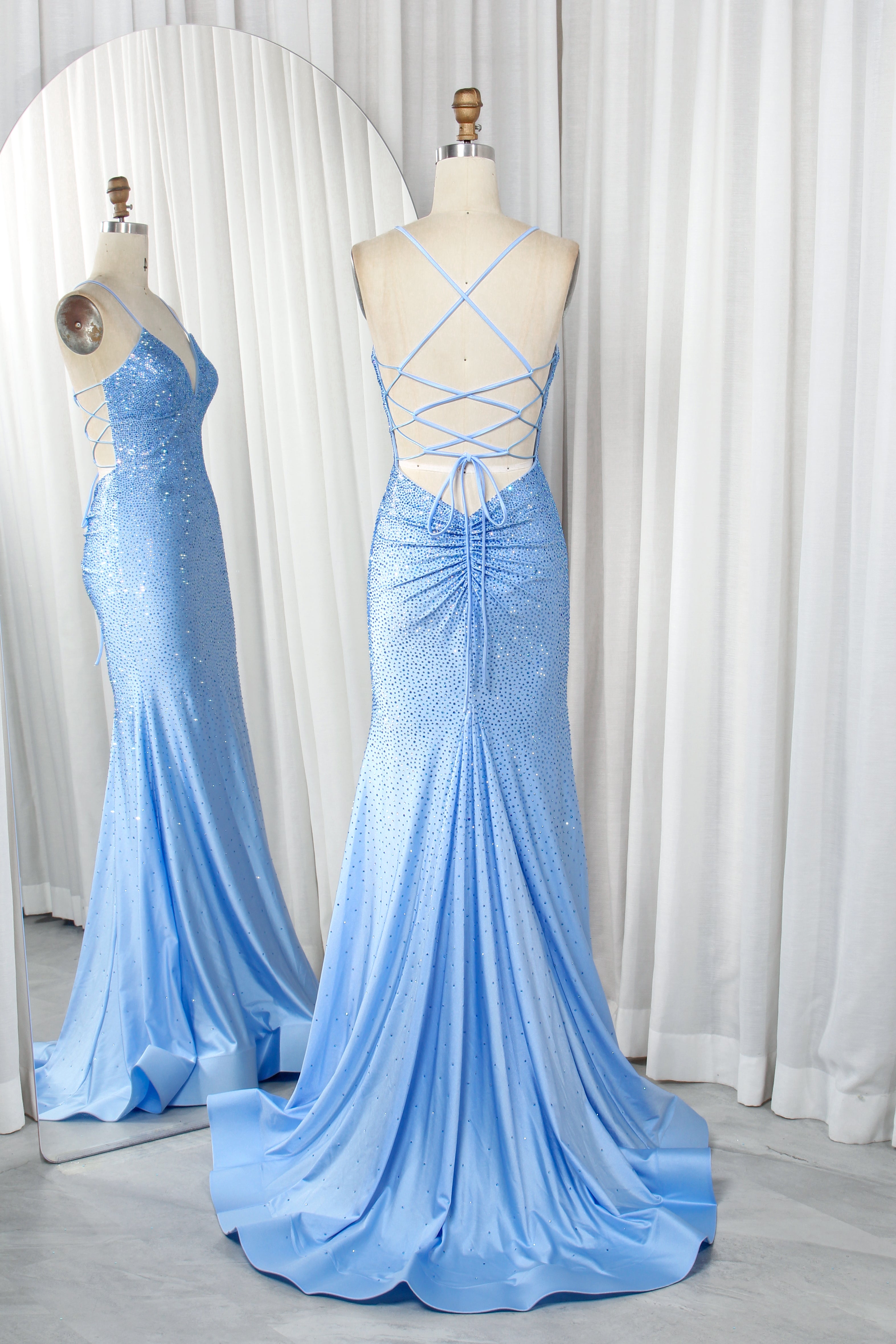 Sparkly rhinestone mermaid prom dress in light blue with caged lace-up back