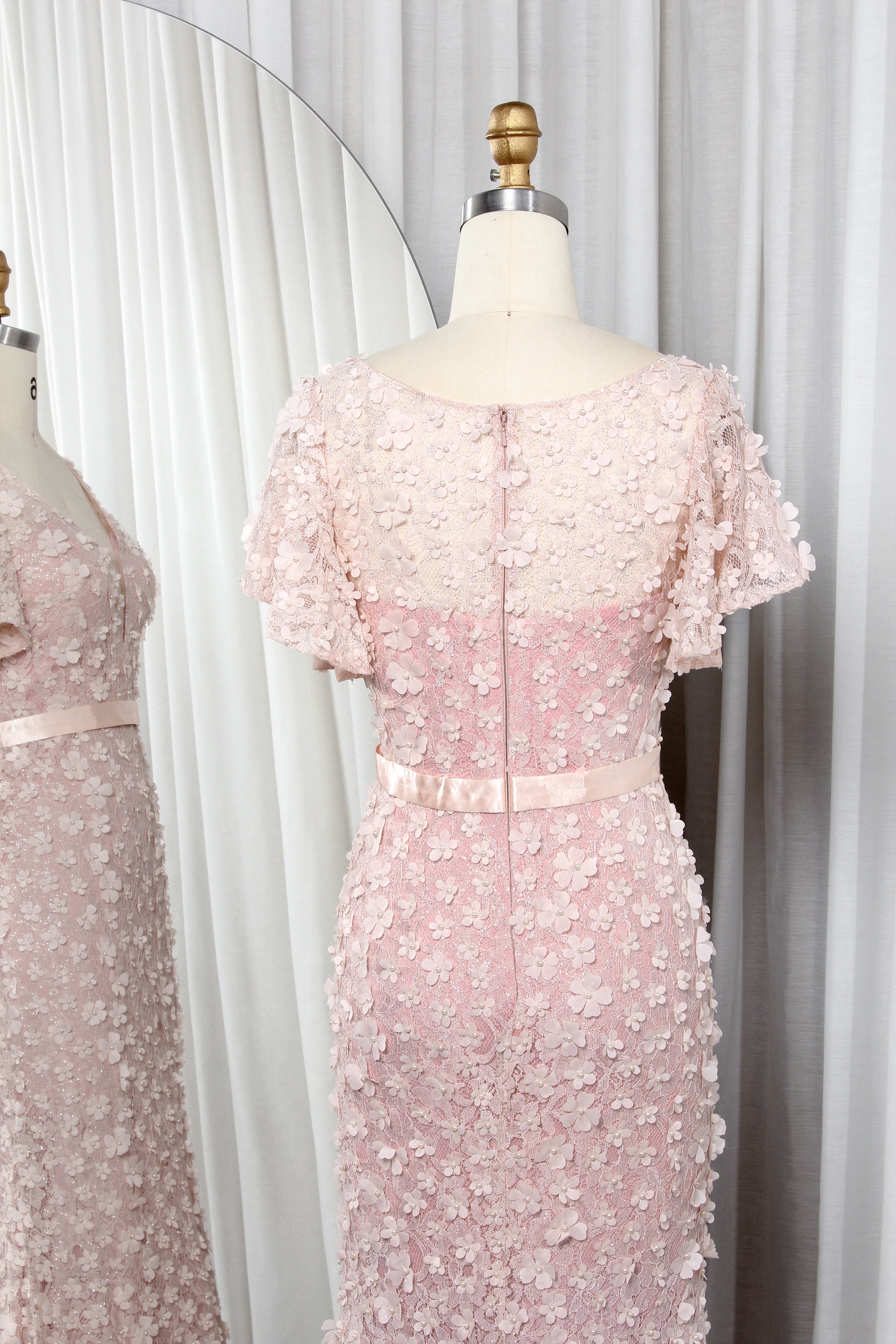 Pink mermaid formal dress with back yoke and short ruffle sleeves, floral appliques