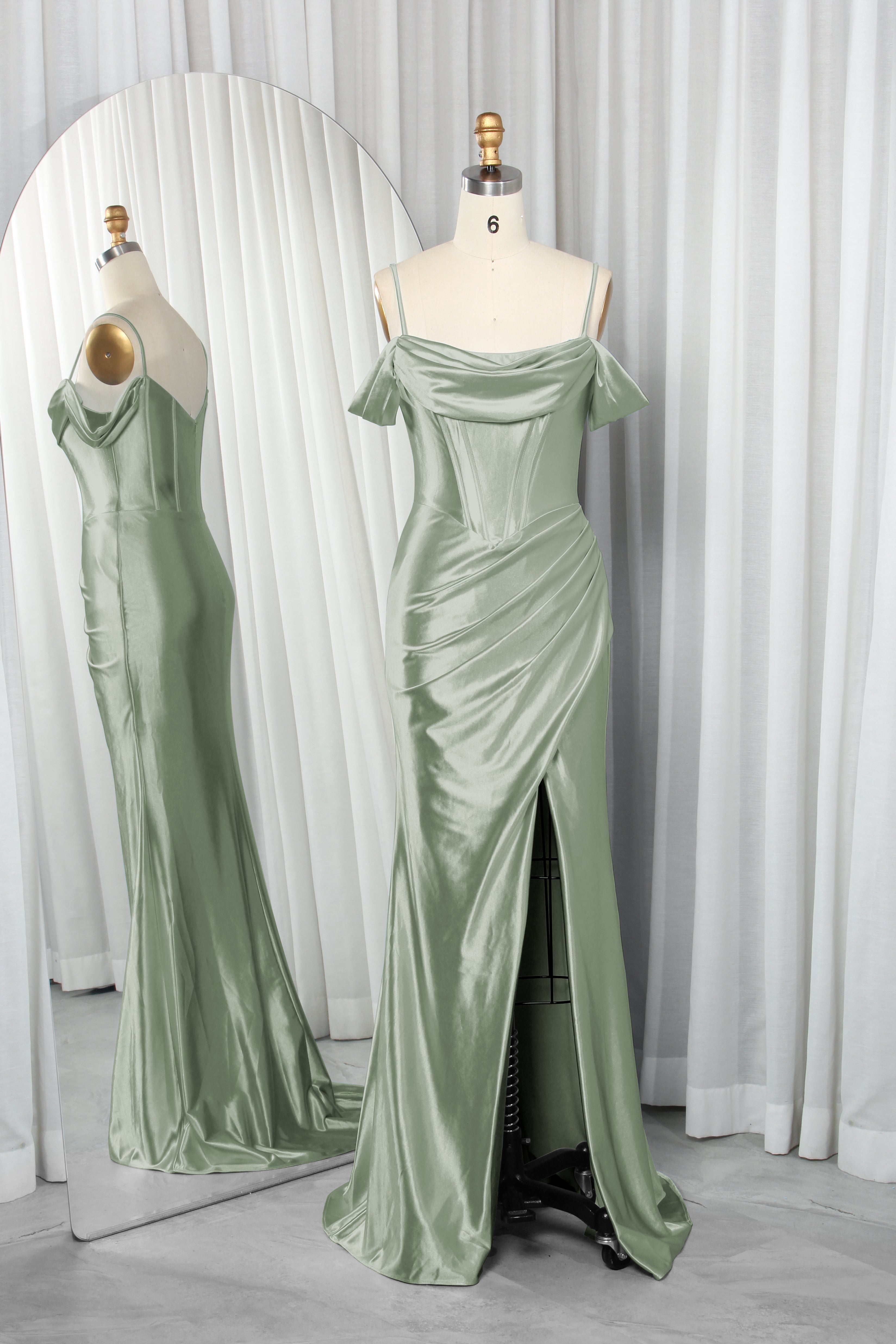 Green satin prom dress with A-line silhouette.