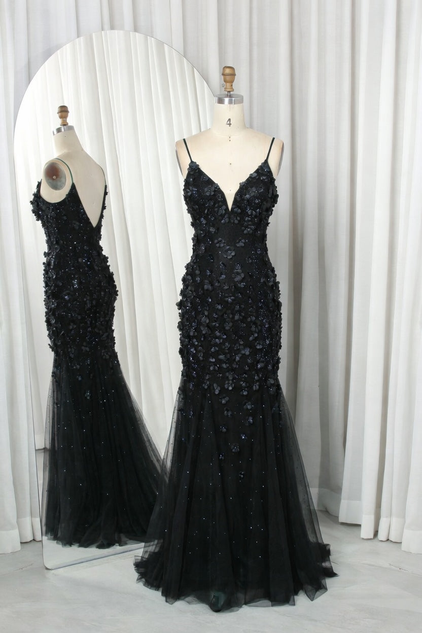 Black sequined mermaid prom dress on mannequins, V-neck, spaghetti straps, tulle flare
