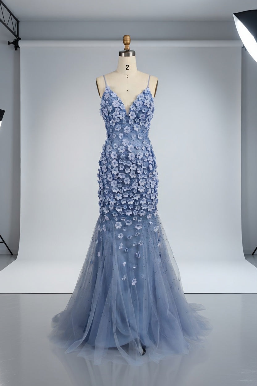 Dusty blue sequined mermaid prom dress on mannequin, V-neck, thin straps, floral appliques