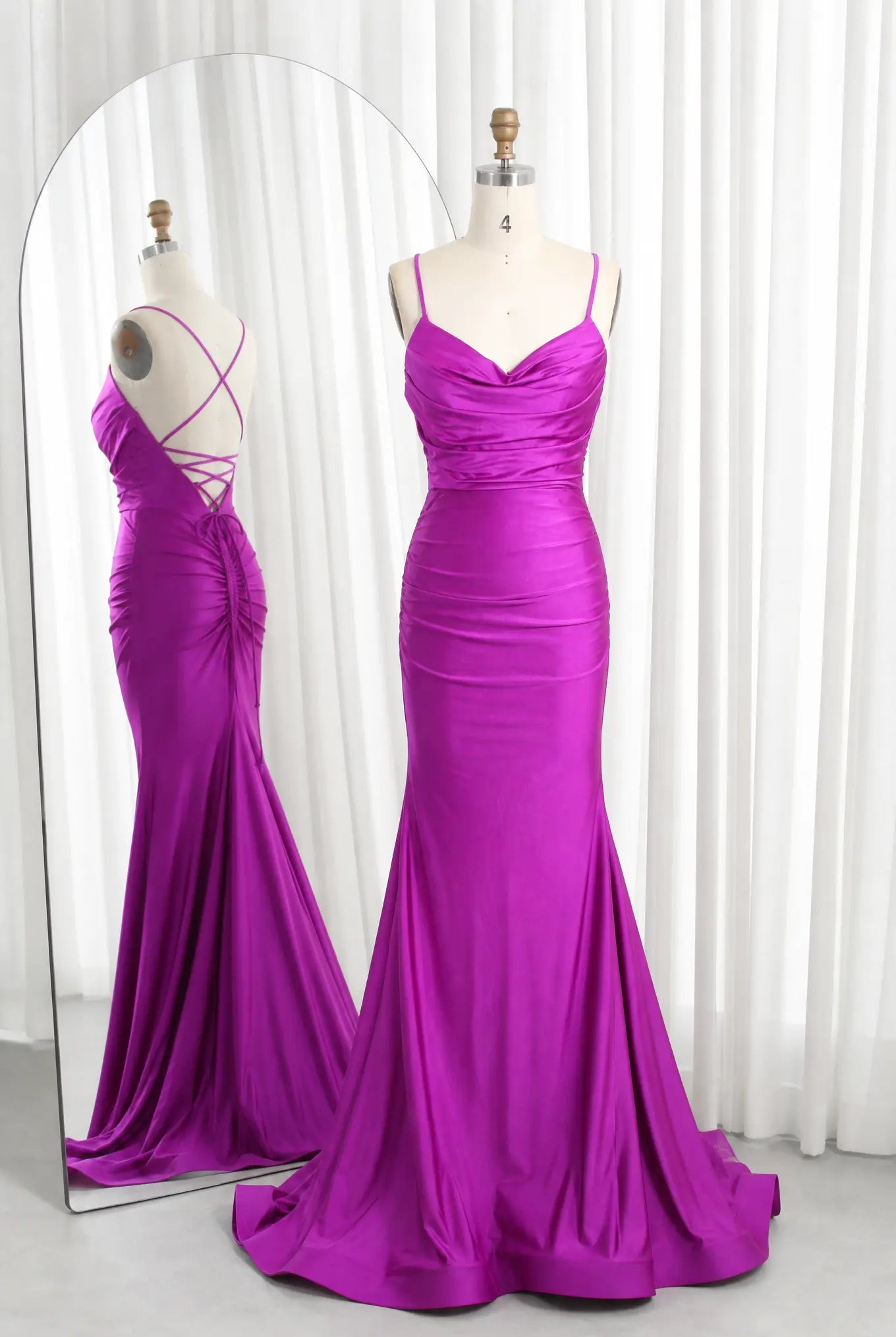 Purple satin cowl-neck ruched mermaid prom dress with spaghetti straps and lace-up back.