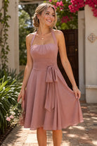 Dusty rose halter-neck chiffon short dress with waist sash and bow, front view