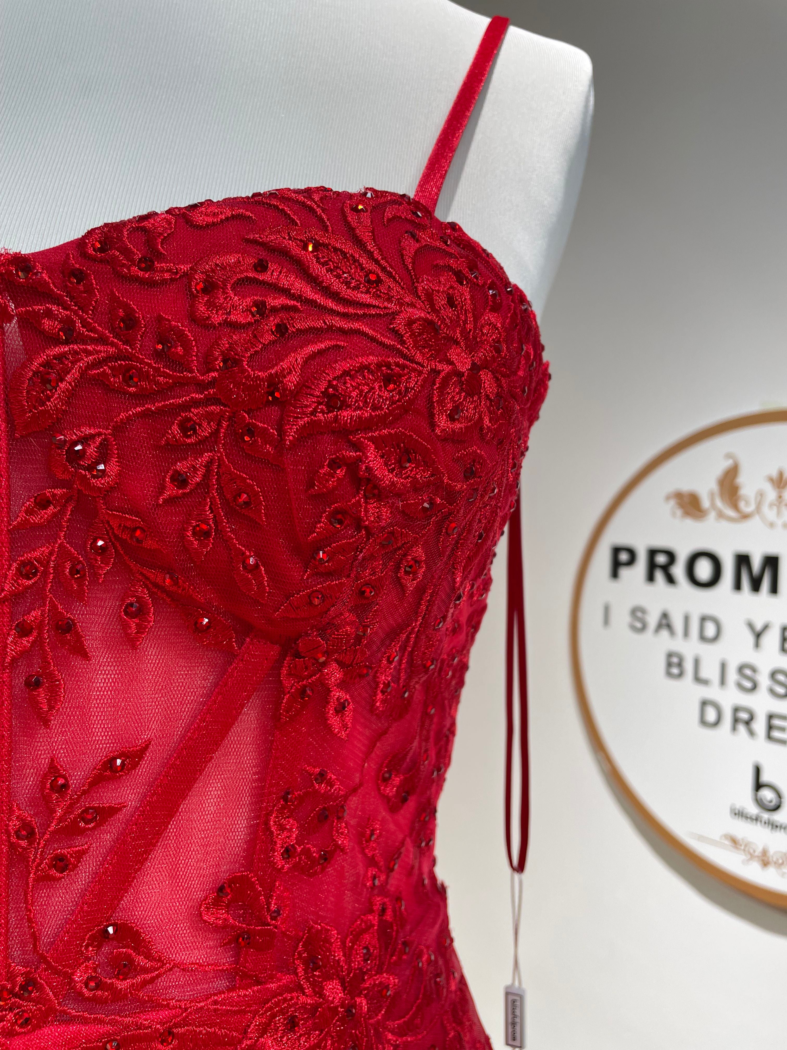 Red lace corset bodice with beaded floral applique and thin spaghetti straps