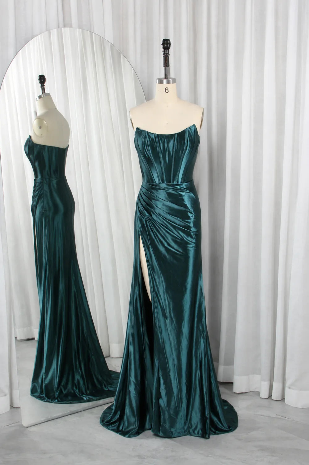Teal strapless corset prom dress in liquid satin, ruched bodice, long skirt with slit