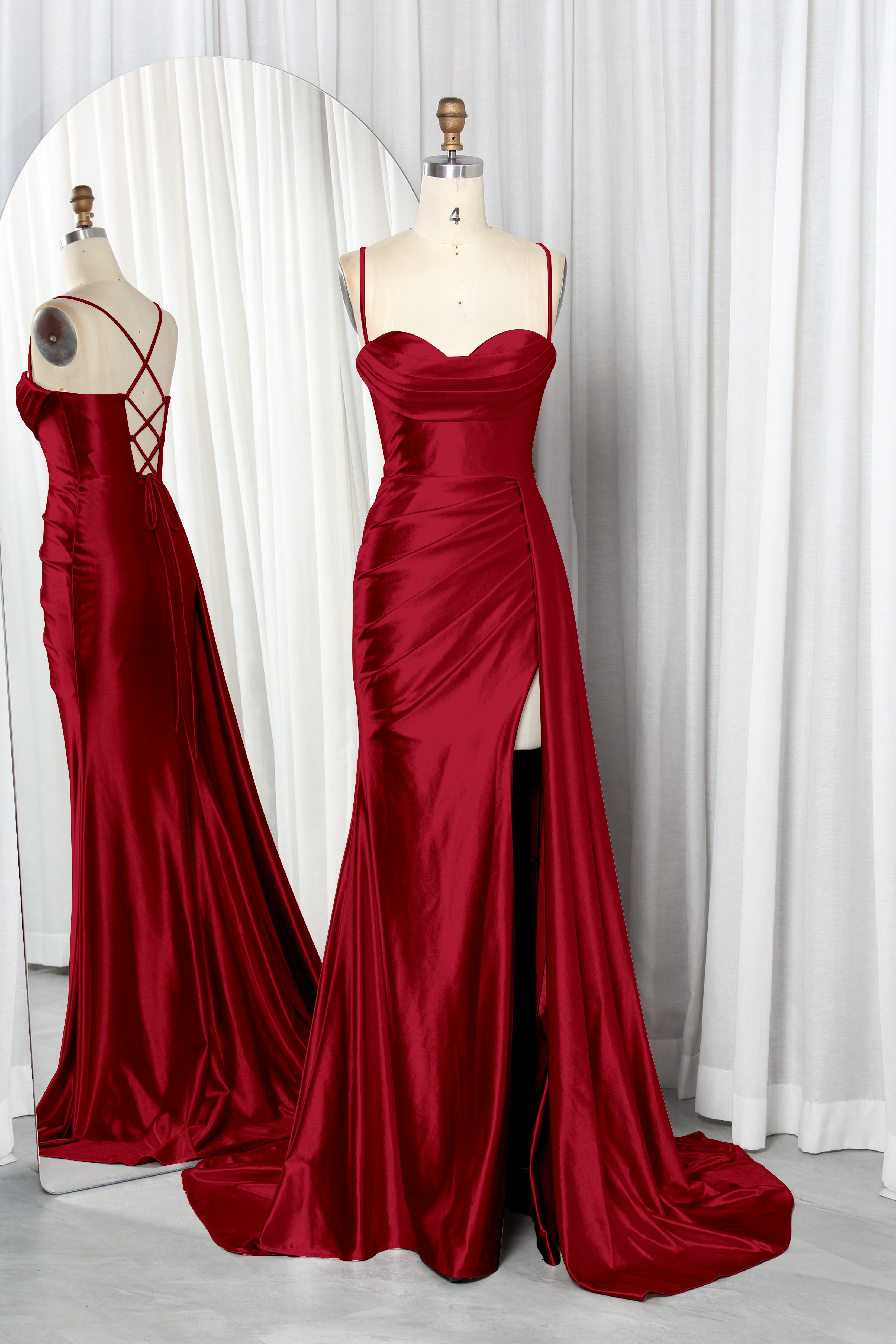 satin prom dress with spaghetti straps, a draped bodice, and a high slit.
