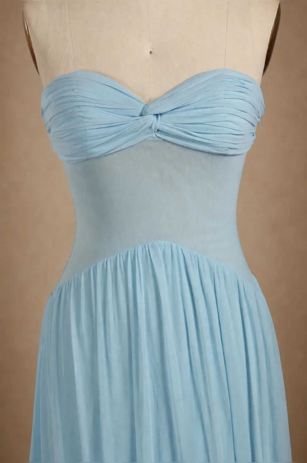 Sky blue strapless sweetheart dress with bow detail, ruched bodice, pleated skirt
