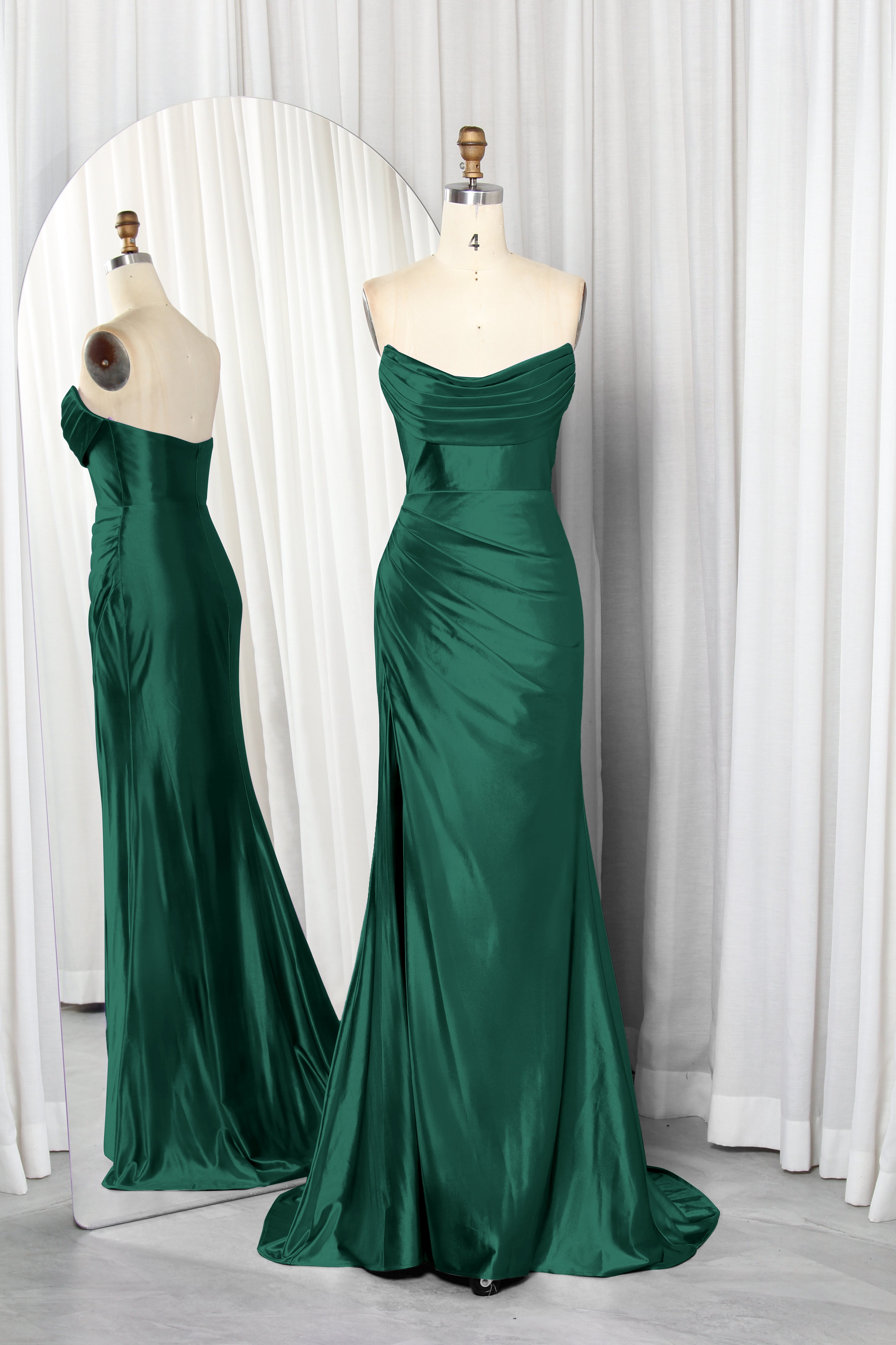 strapless satin dress with a draped bodice and high slit.
