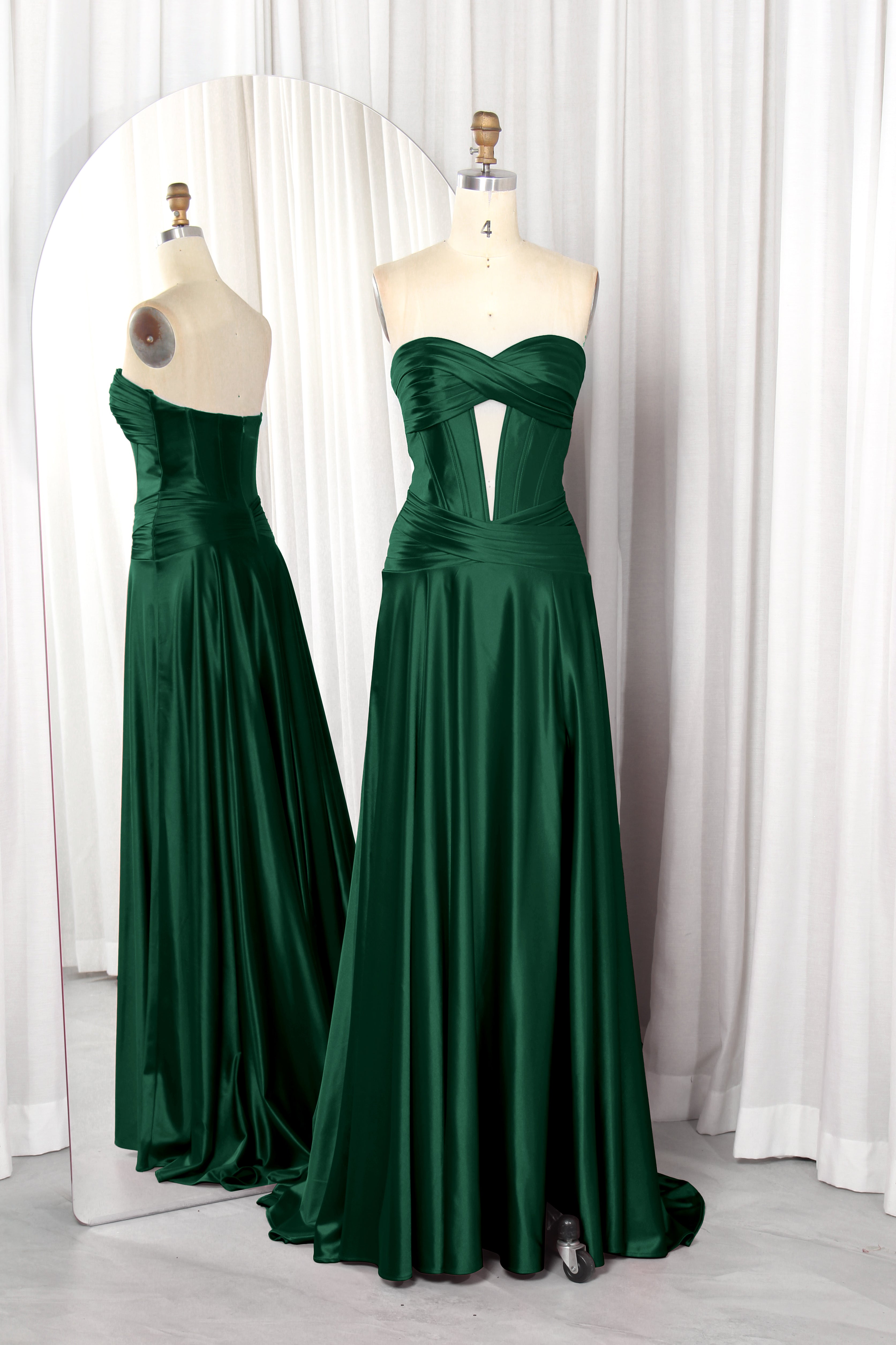 strapless satin prom dress with a front cutout and high slit.