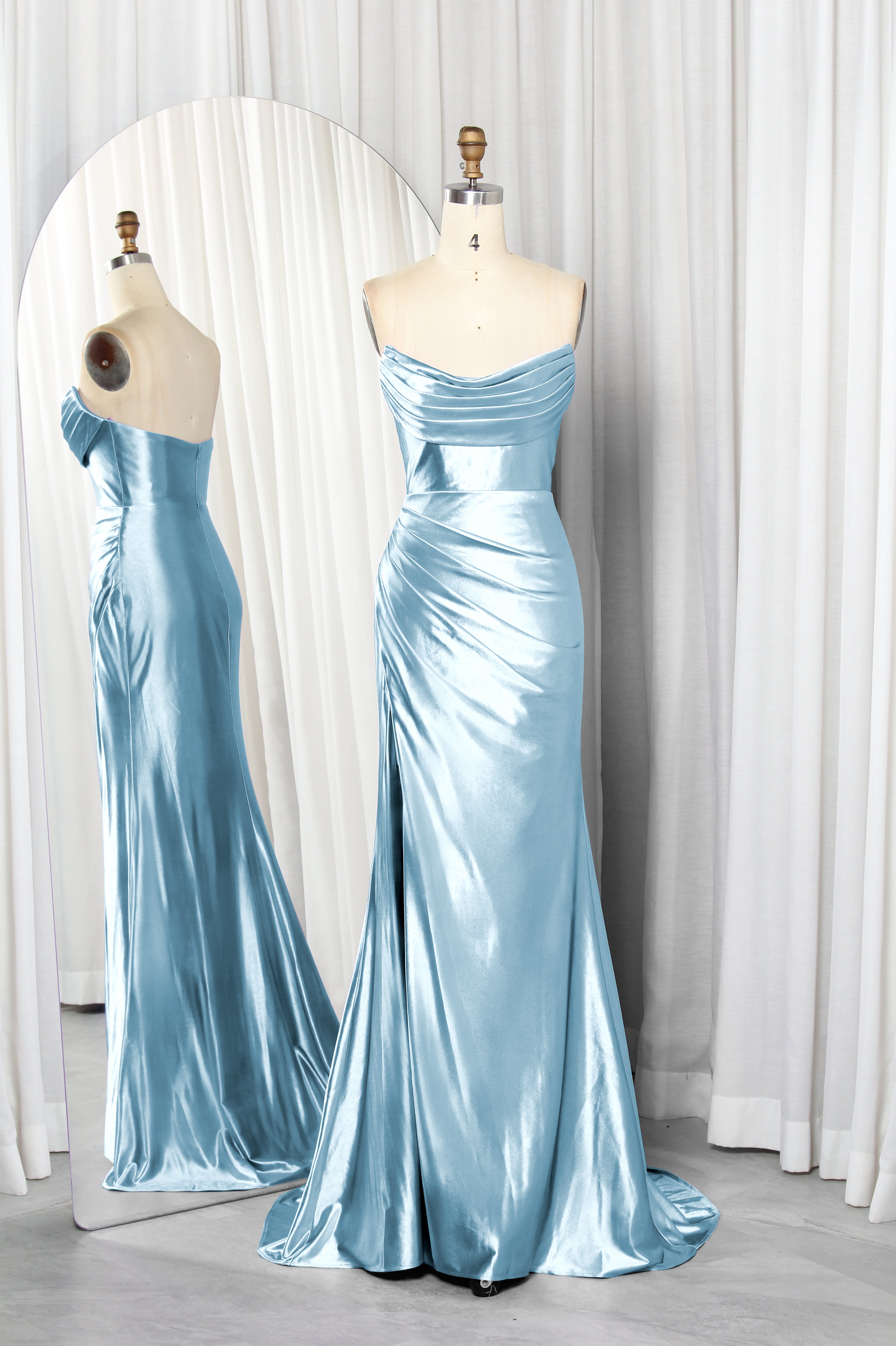 strapless satin dress with a draped bodice and high slit.