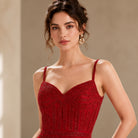 Red sequin bodycon dress with sweetheart V-neck bodice and thin shoulder straps