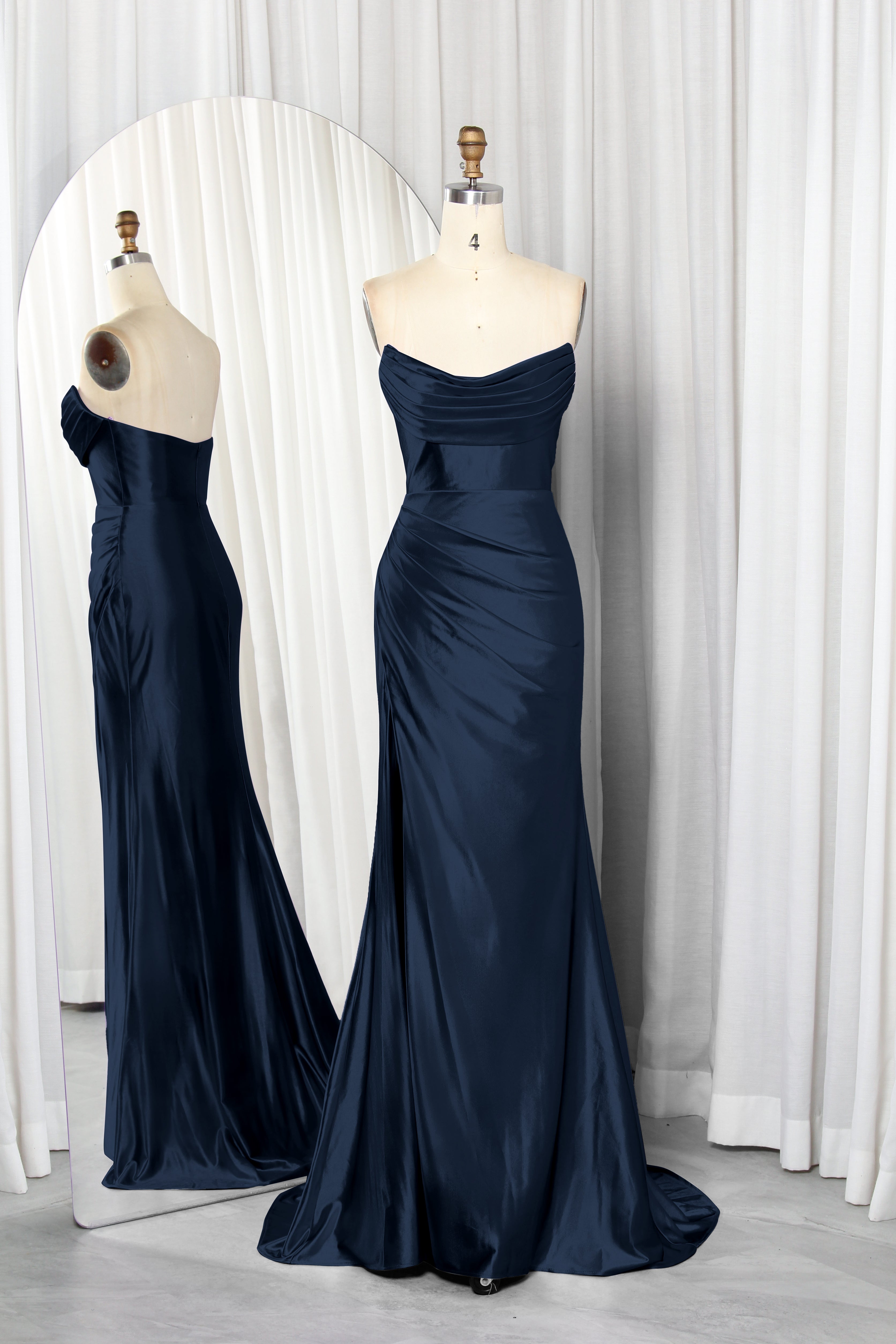 strapless satin dress with a draped bodice and high slit.