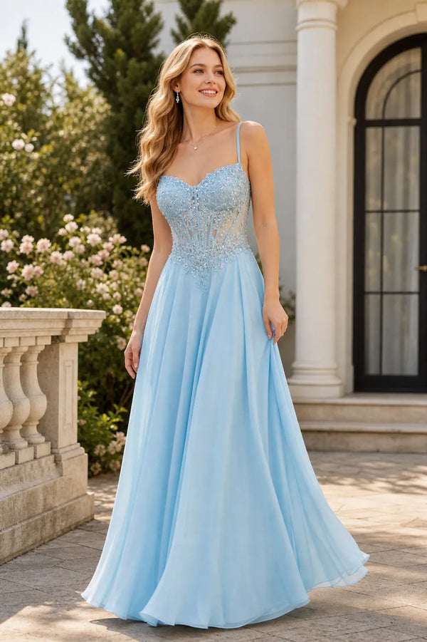 Sky blue embellished evening gown, spaghetti straps, fitted beaded bodice, flowing skirt