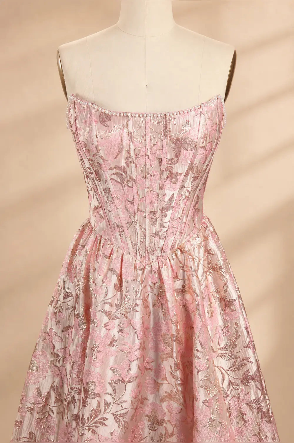 Pink floral corset-style bodice with ruched top and thin straps