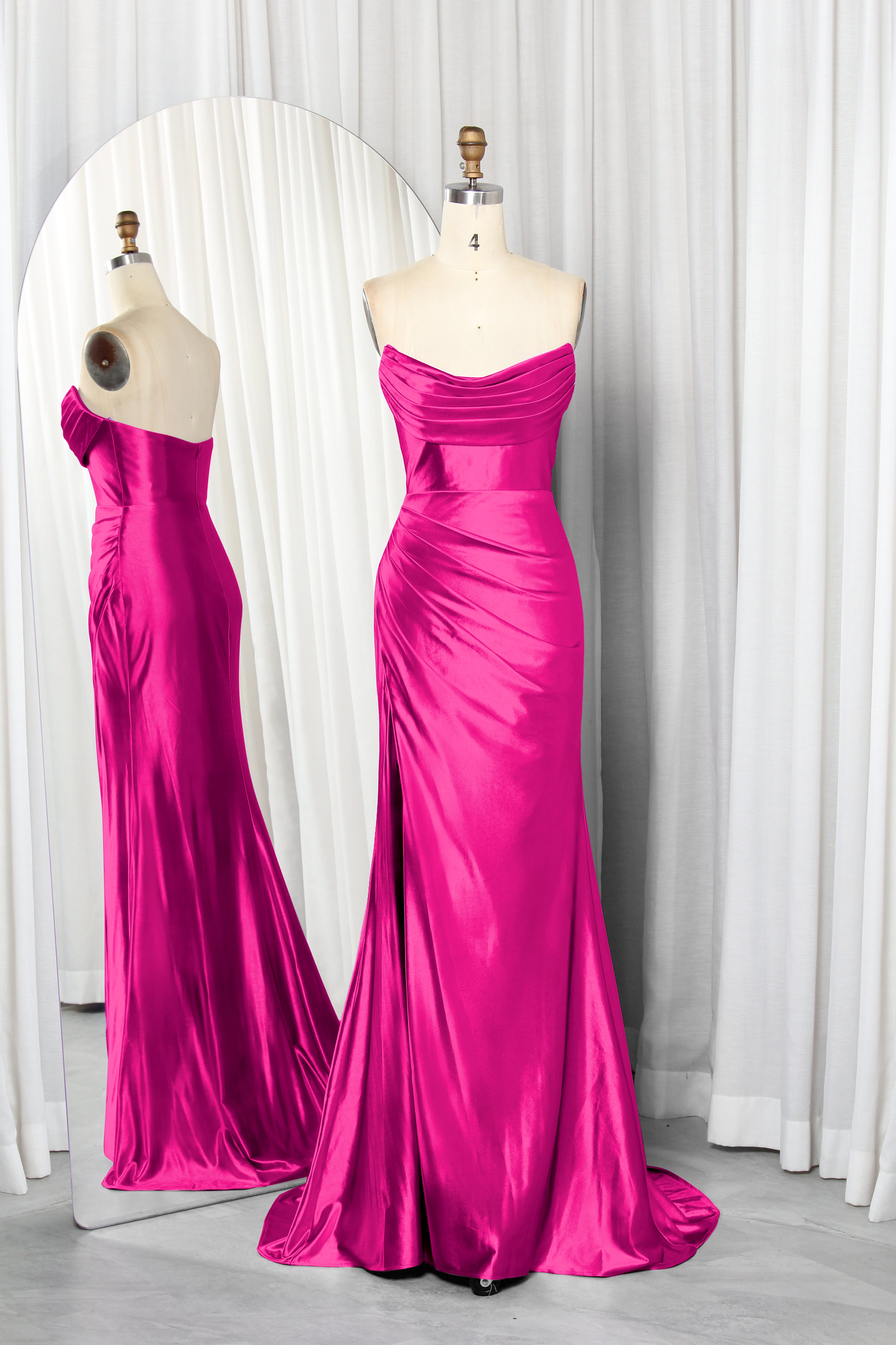 strapless satin dress with a draped bodice and high slit.