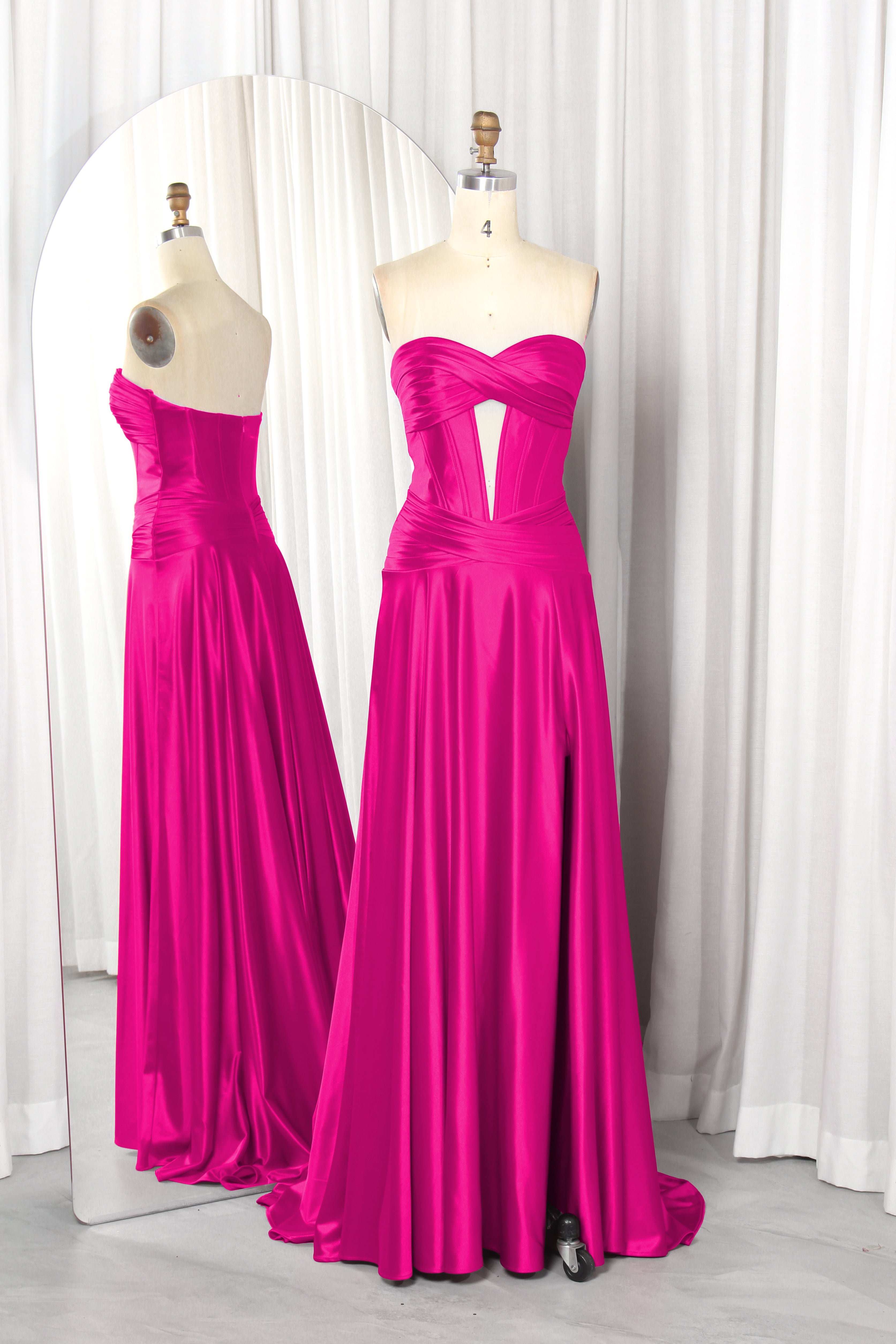 strapless satin prom dress with a front cutout and high slit.