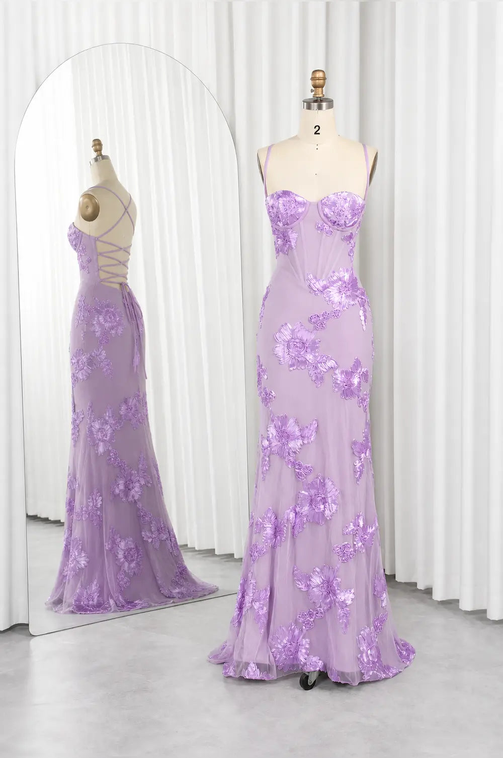 Lavender evening gown with spaghetti straps and floral sequin appliques, full-length