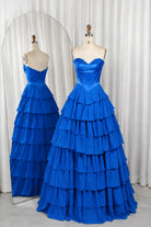 Royal-blue strapless corset-style bodice ball gown with tiered ruffle skirt.